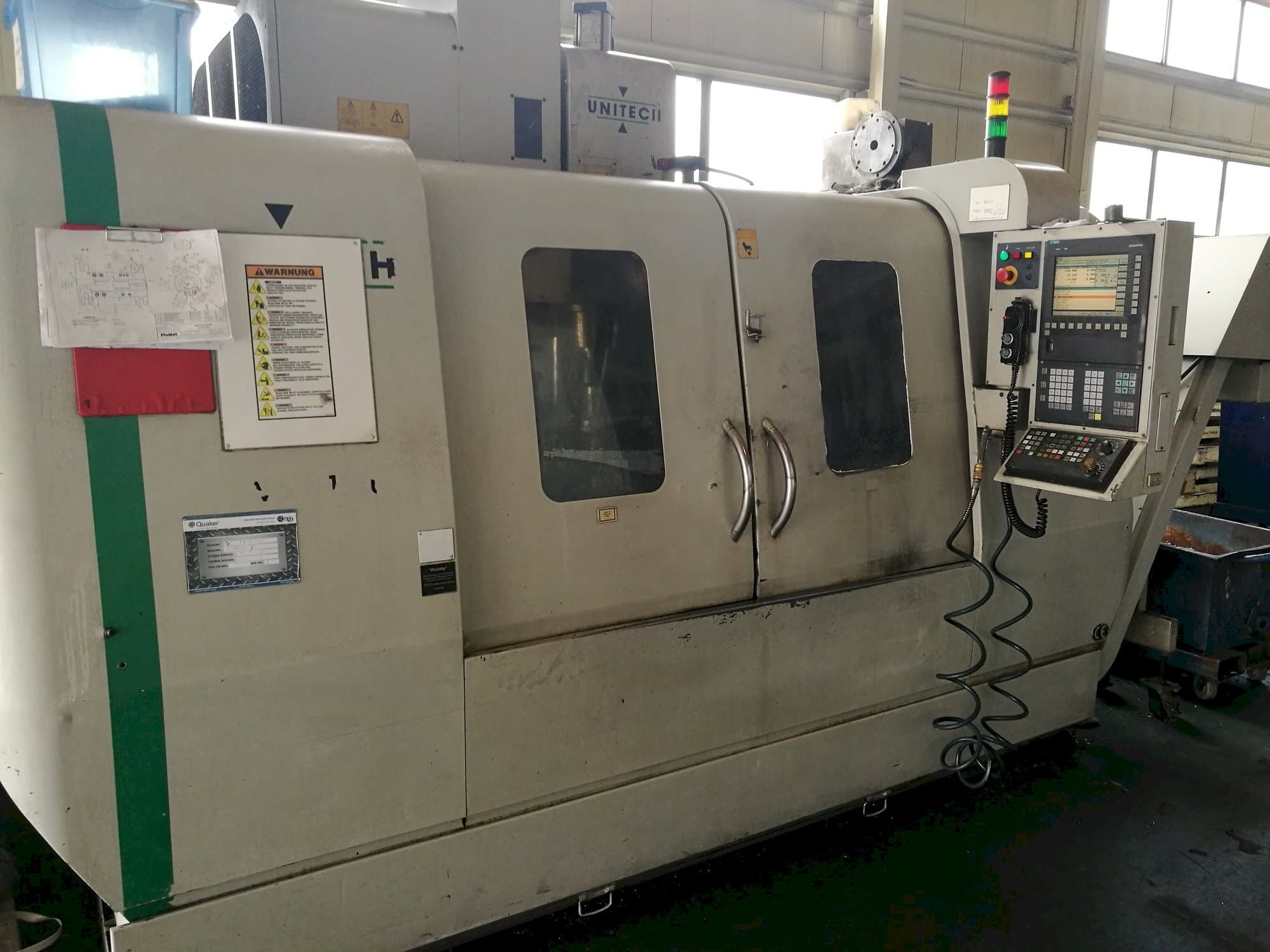 Masina UNITECH VMC-1250P3 eestvaade