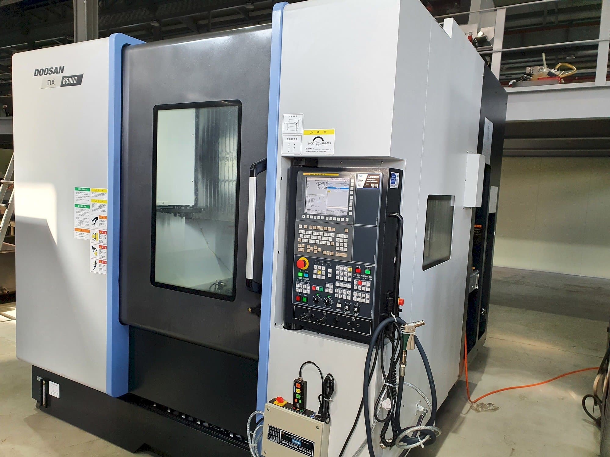 Masina Doosan NX6500Ⅱ eestvaade
