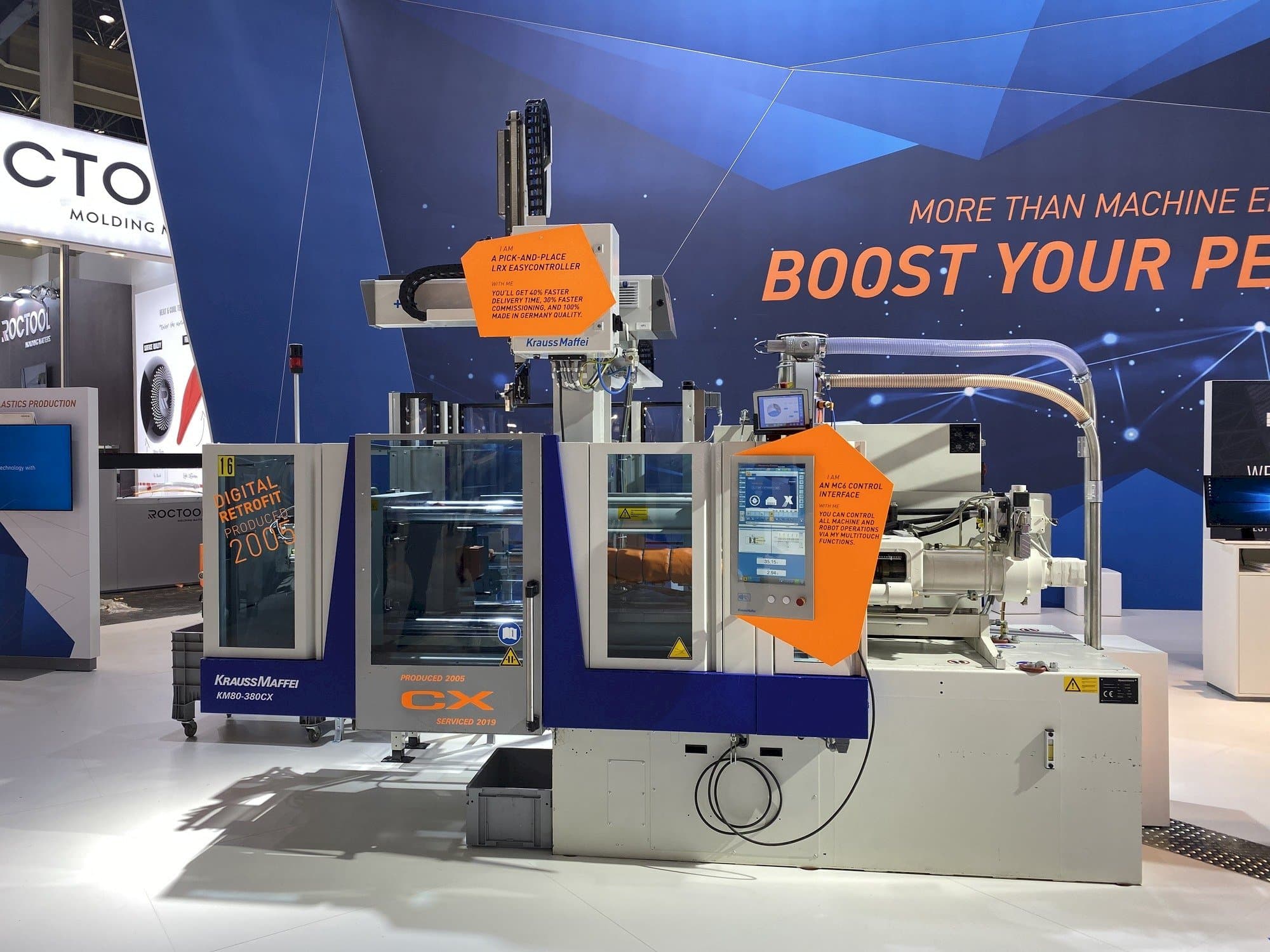 Masina Krauss Maffei 80-380 CX + LRX easyControl 100 eestvaade