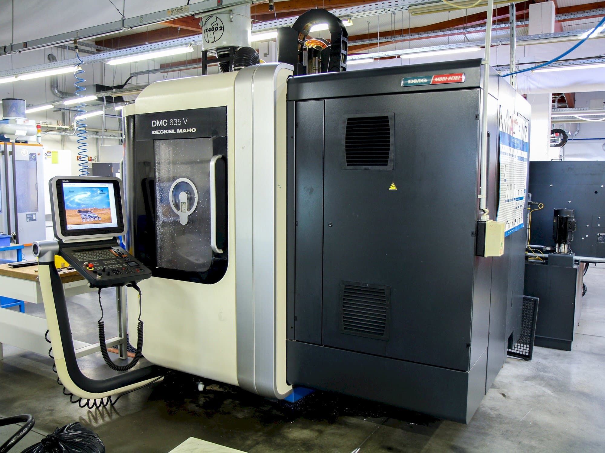 Masina DMG MORI DMC 635V PW eestvaade