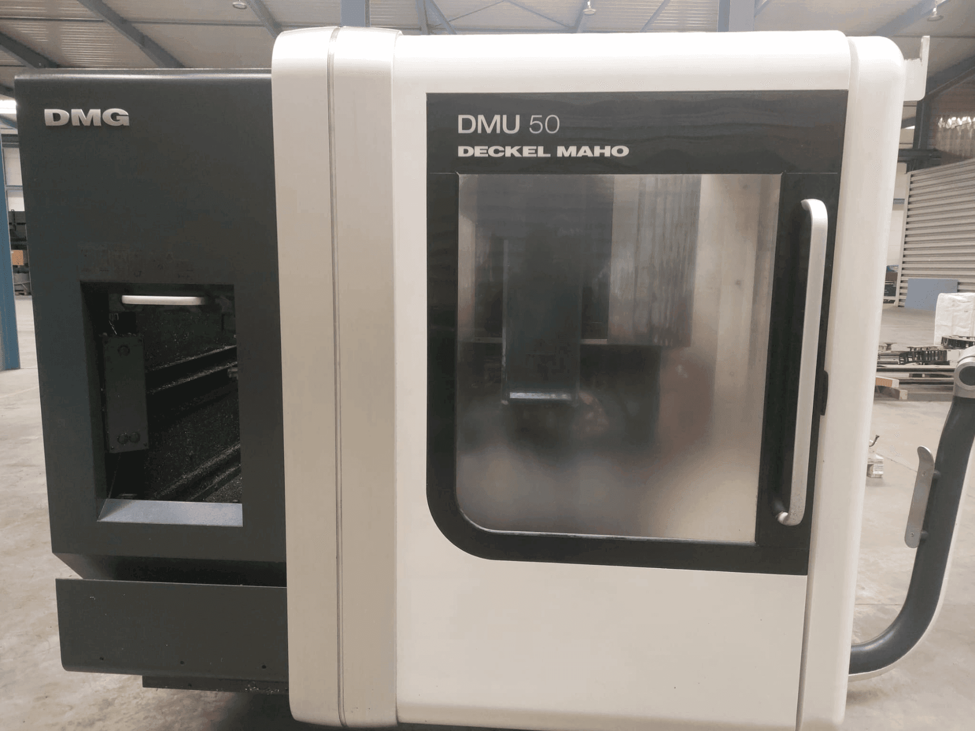 Masina DMG DECKEL MAHO DMU 50 eestvaade