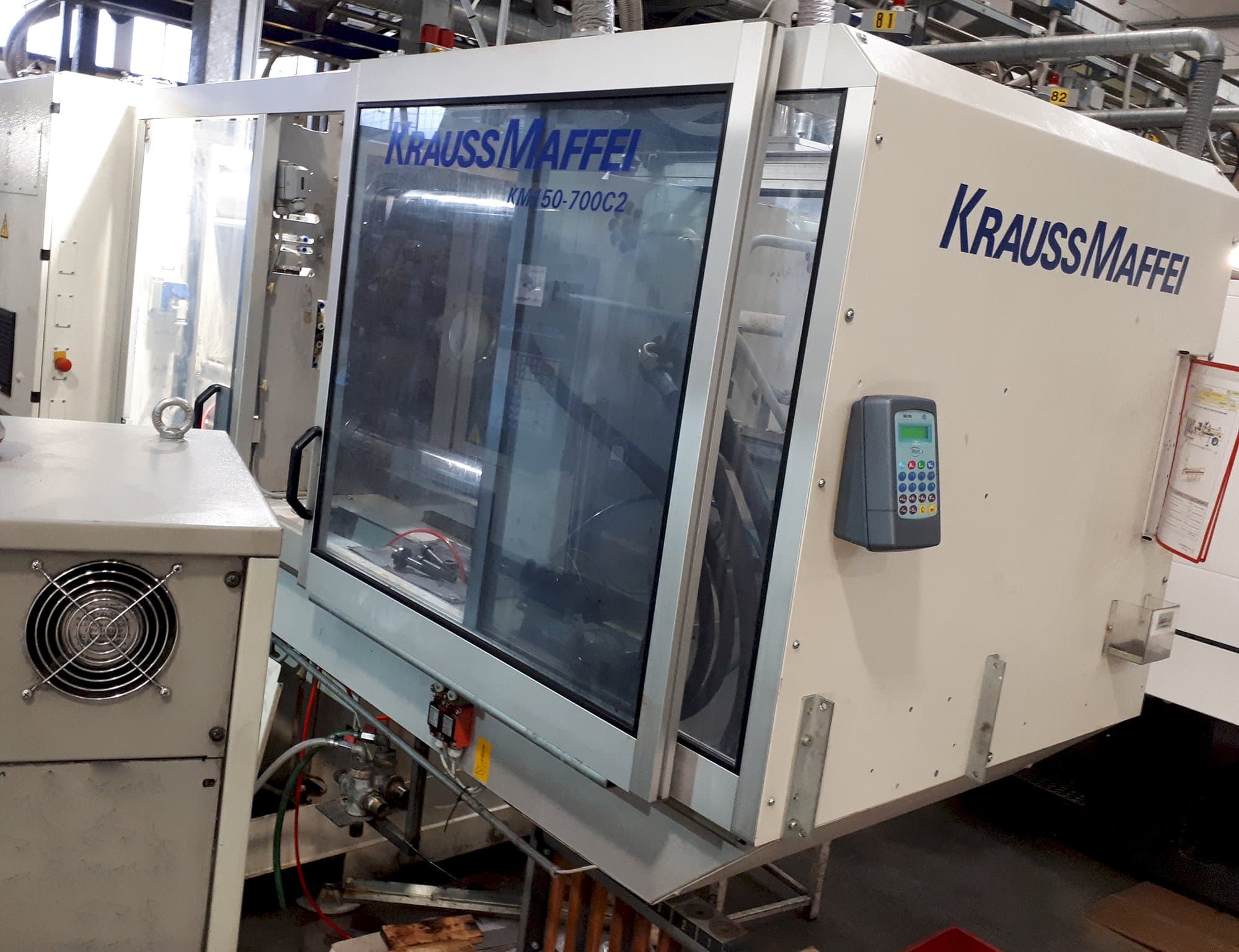 Masinavaade Krauss Maffei C2 150-700 paremalt