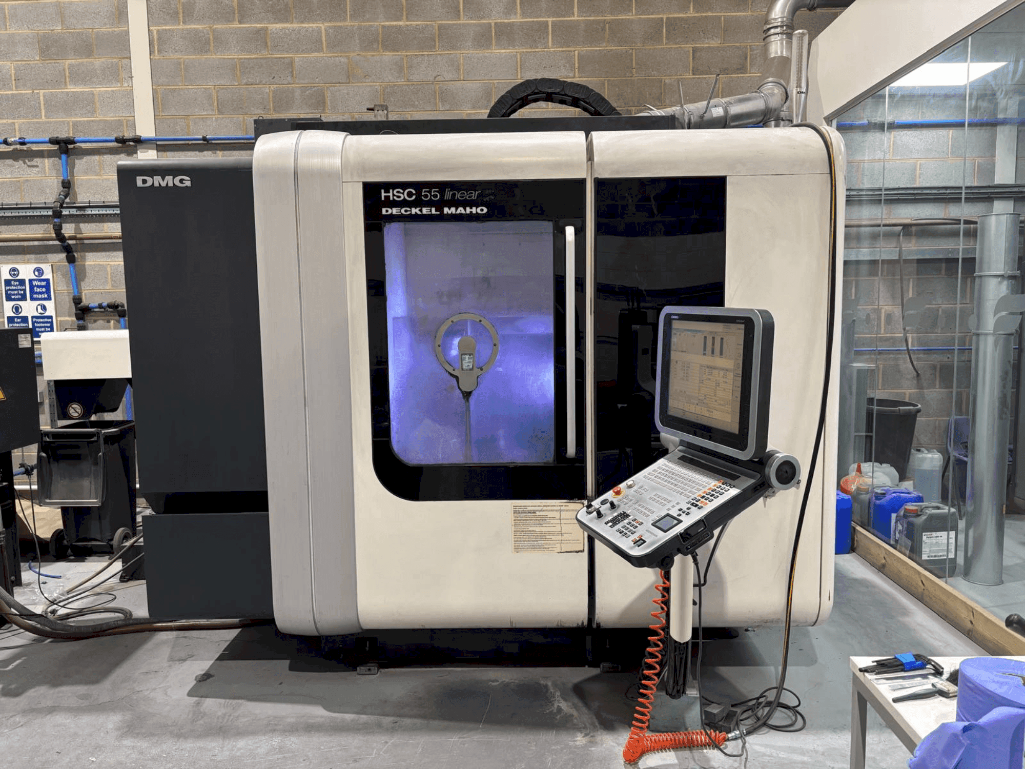 Masina DMG DECKEL MAHO HSC 55 linear eestvaade