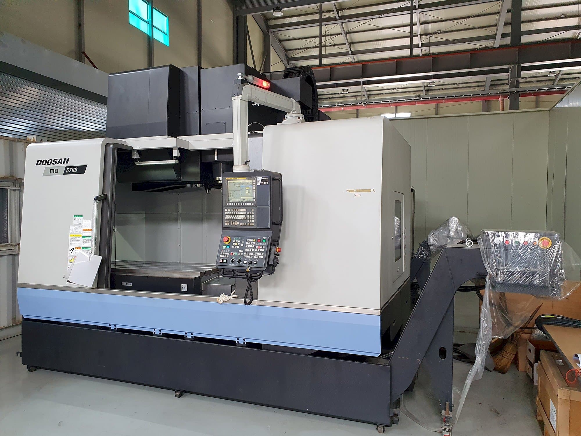 Masina Doosan MD6700 eestvaade