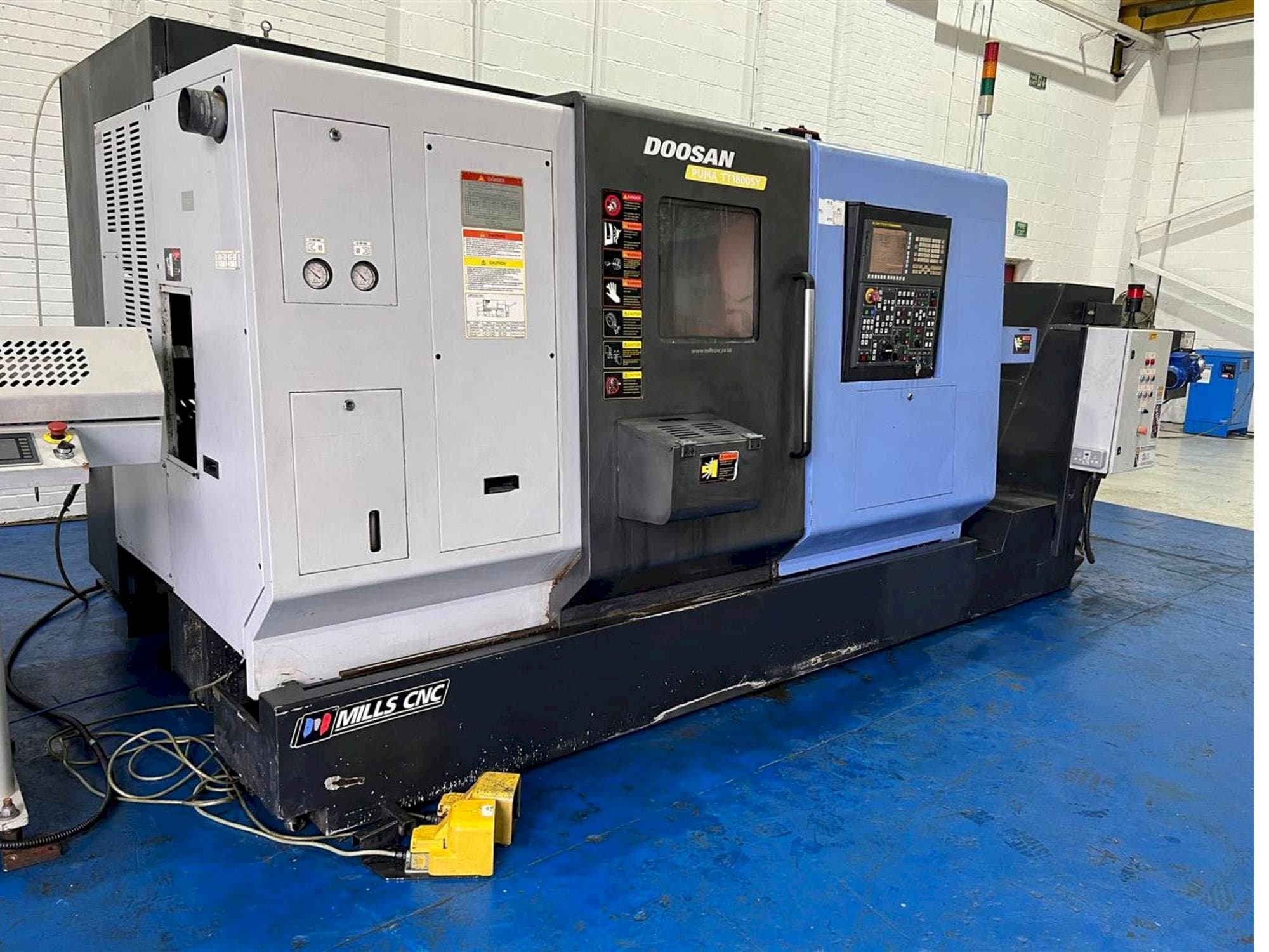 Masina Doosan TT1800SY eestvaade