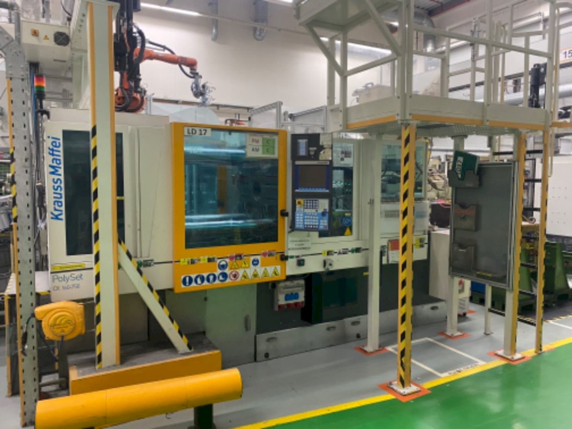 Masina Krauss Maffei 160/750 CX POL eestvaade