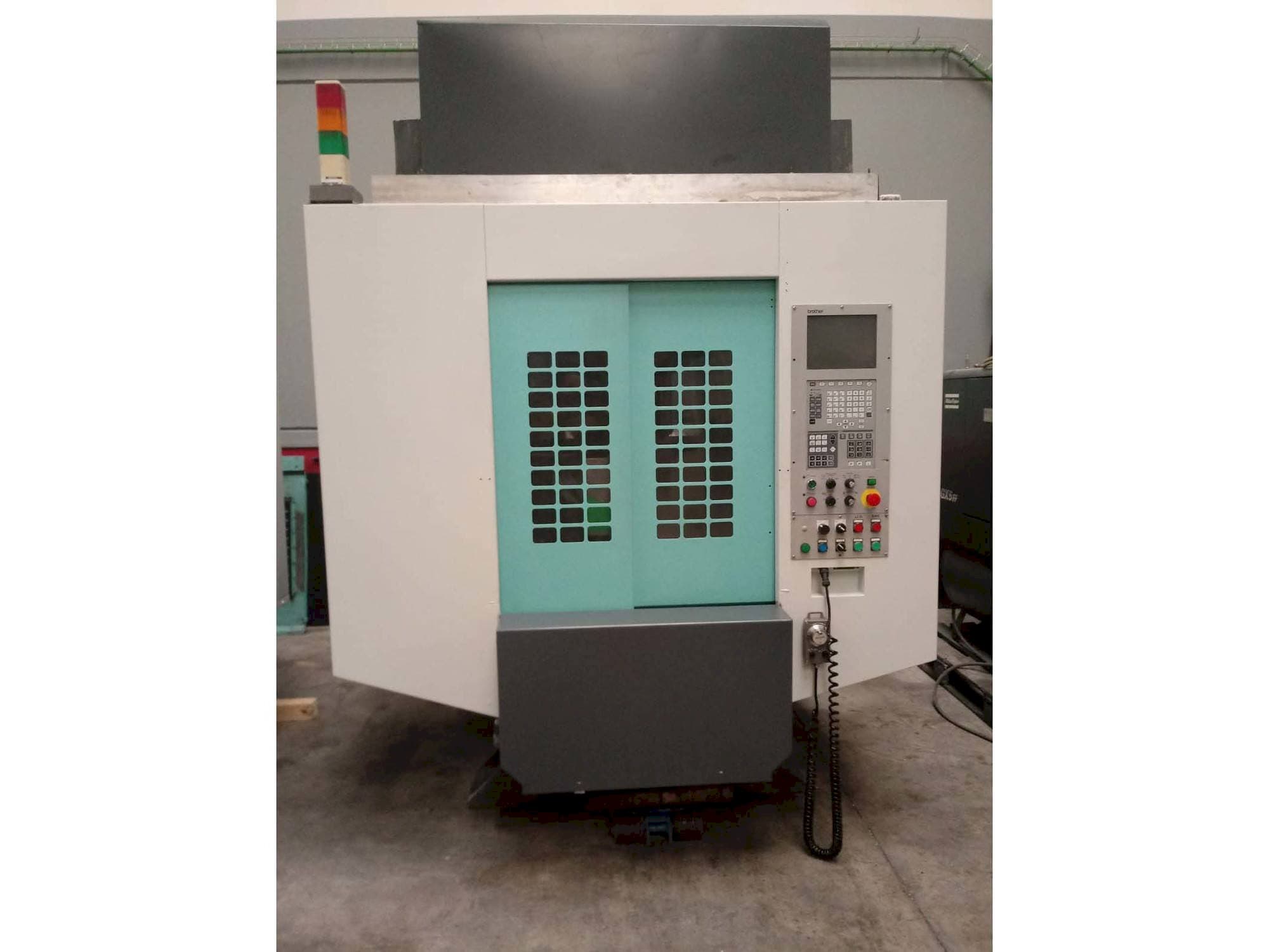 Masina Brother TC-S2DN-O eestvaade