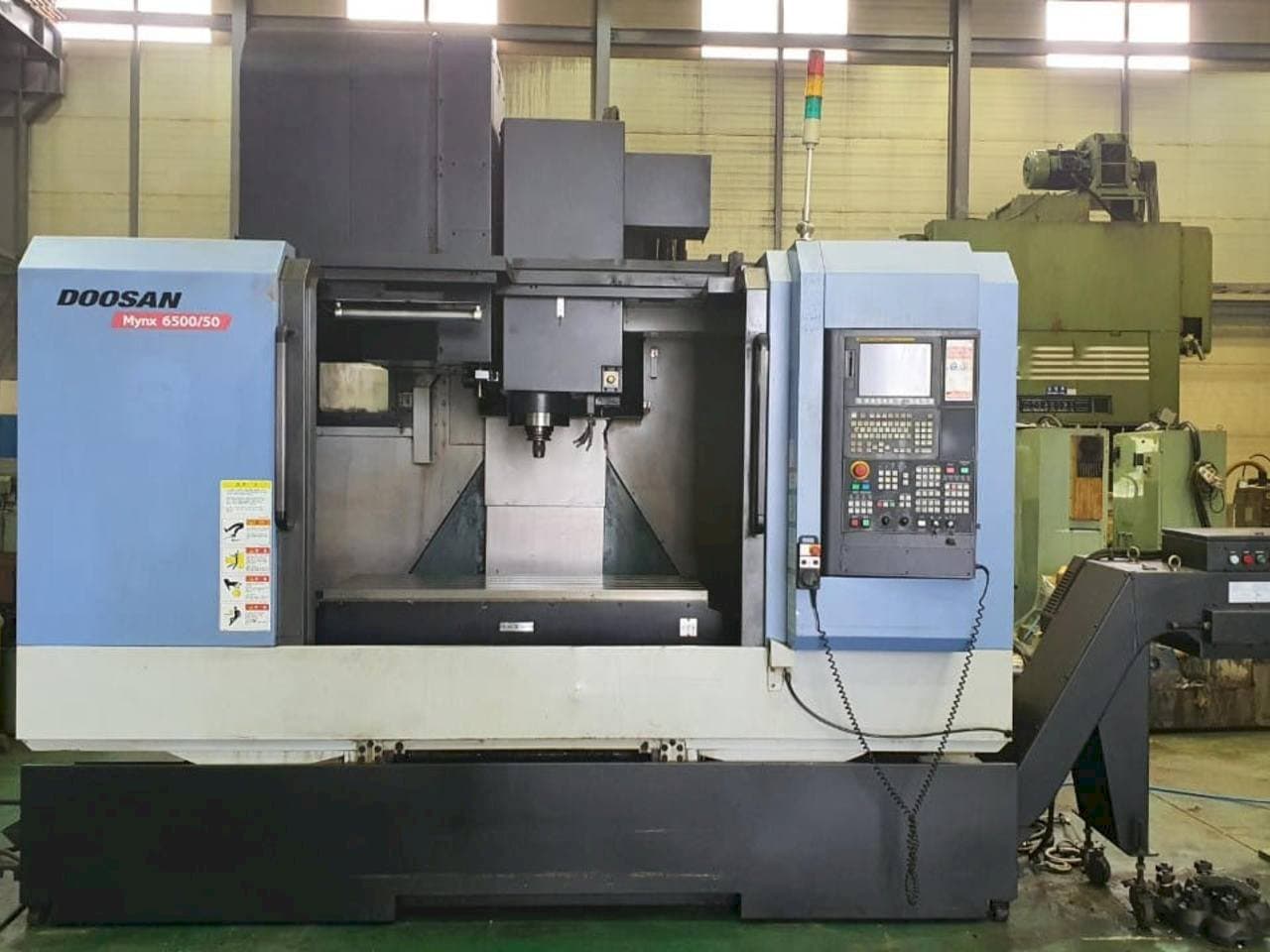 Masina Doosan Mynx 6500/50 eestvaade