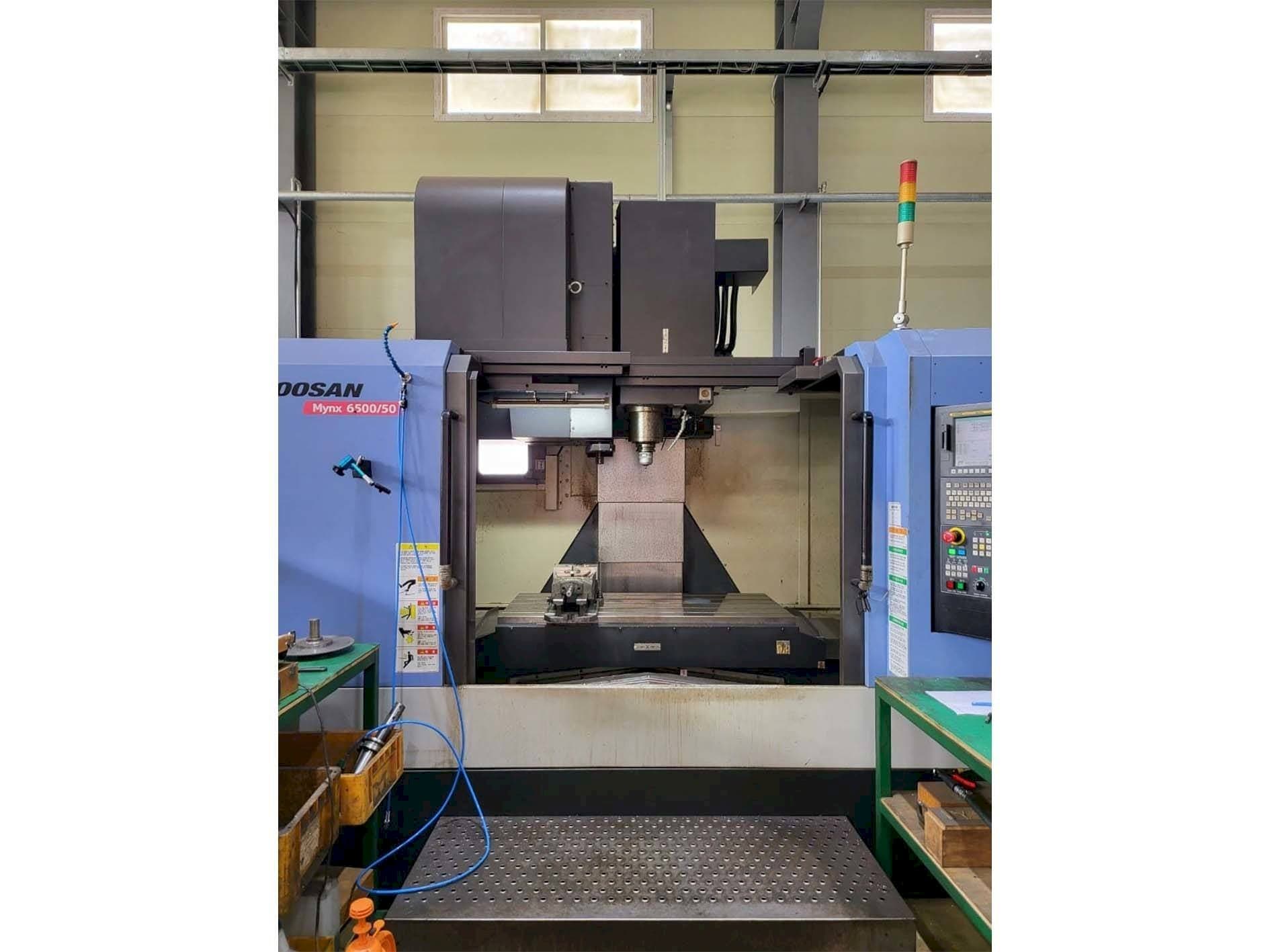 Masina Doosan MYNX 6500/50 eestvaade