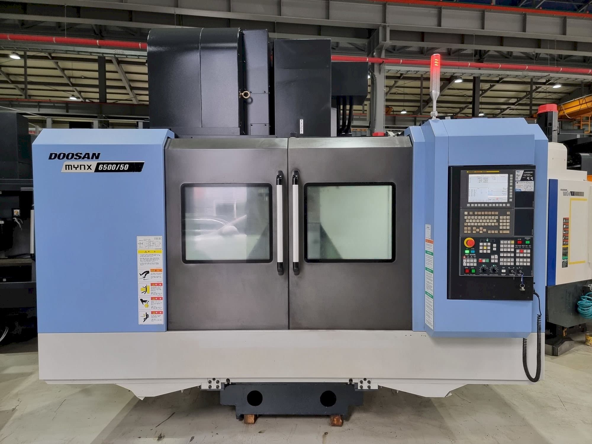 Masina Doosan MYNX 6500/50 eestvaade