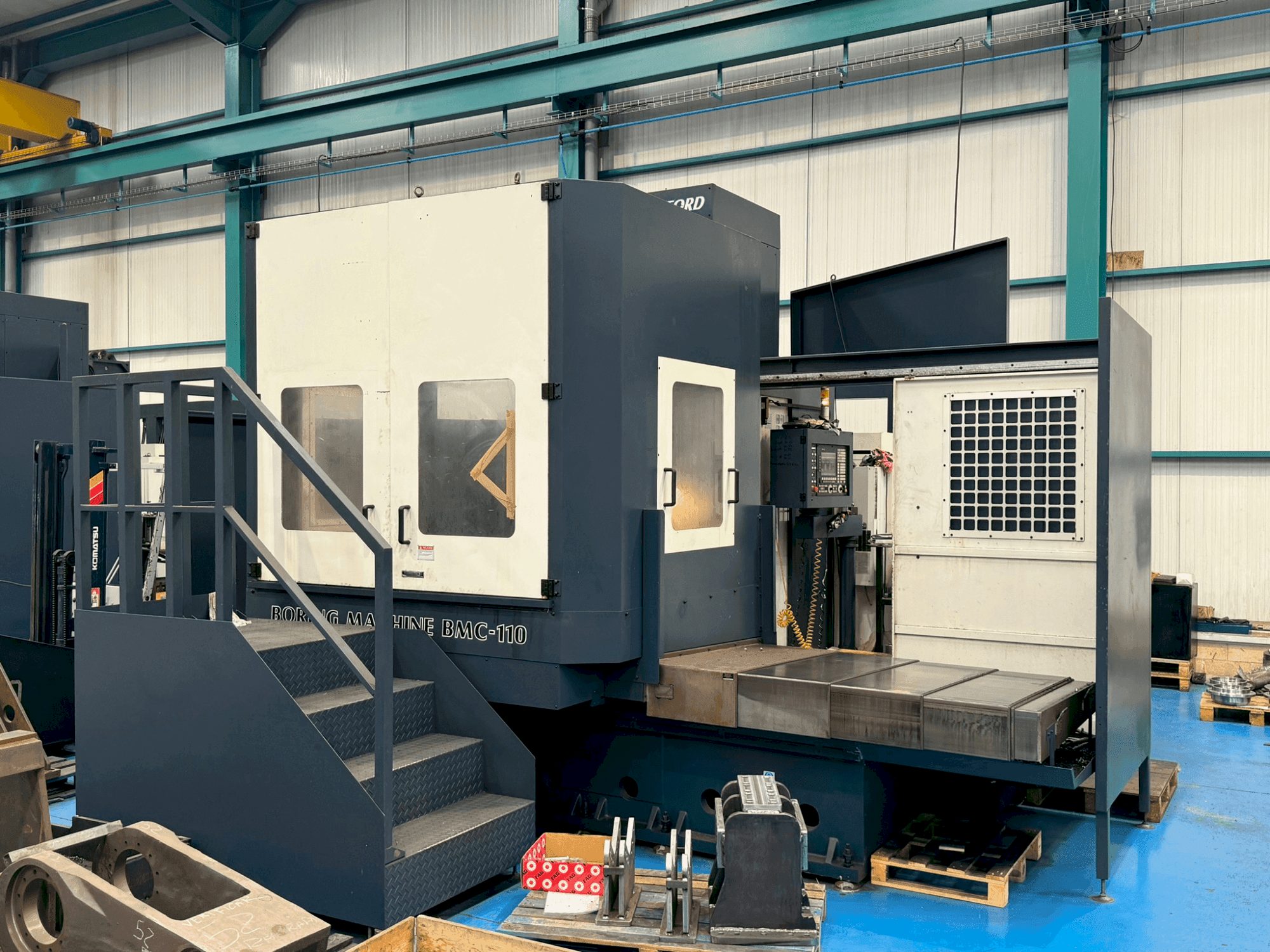 Masina Johnford BMC 110 eestvaade