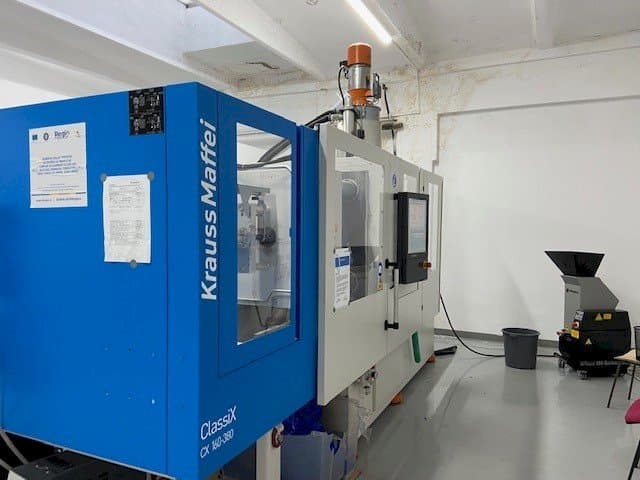 Masina Krauss Maffei ClassiX CX 160-380 vasaku külje vaade