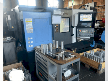 Masina DOOSAN LYNX 2100LSYA eestvaade