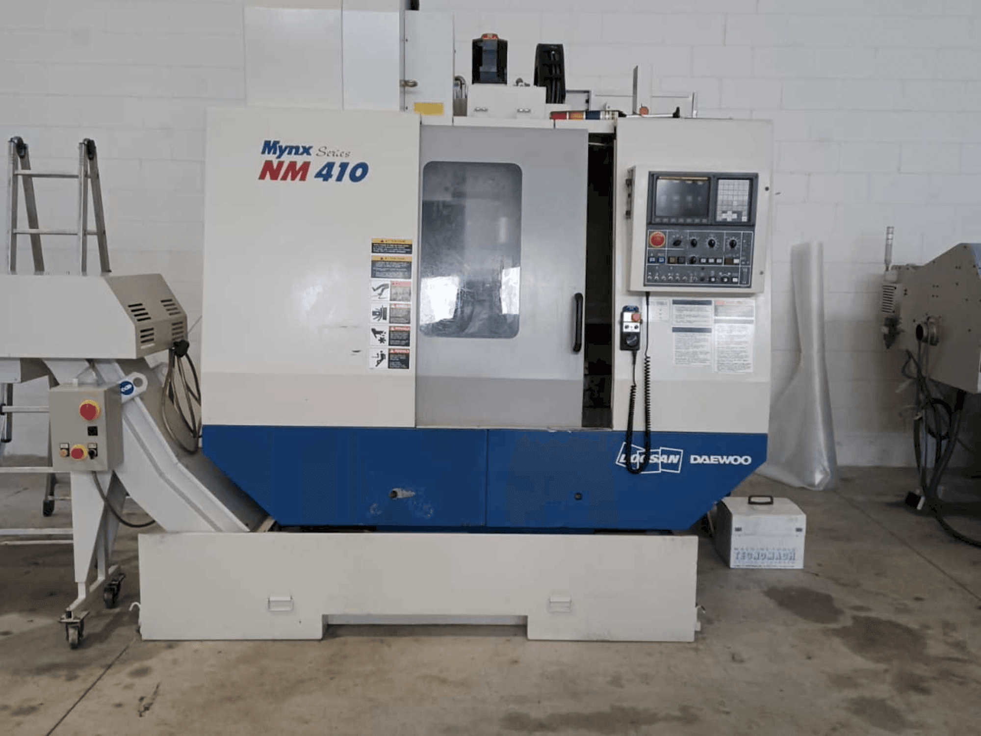 Masina Doosan Mynx NM 410 eestvaade