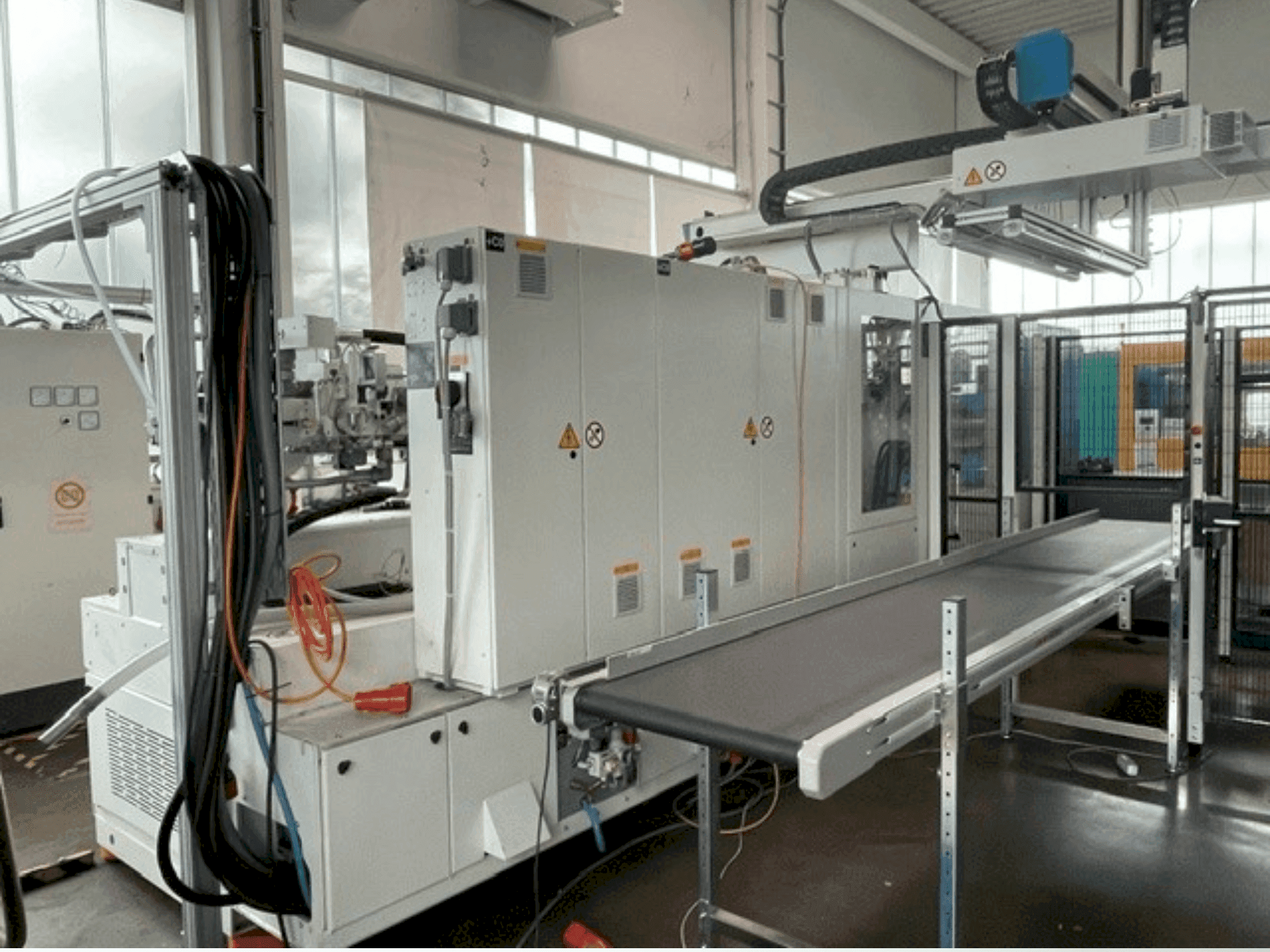 Masina Krauss Maffei 300-1400 CX MC6 eestvaade