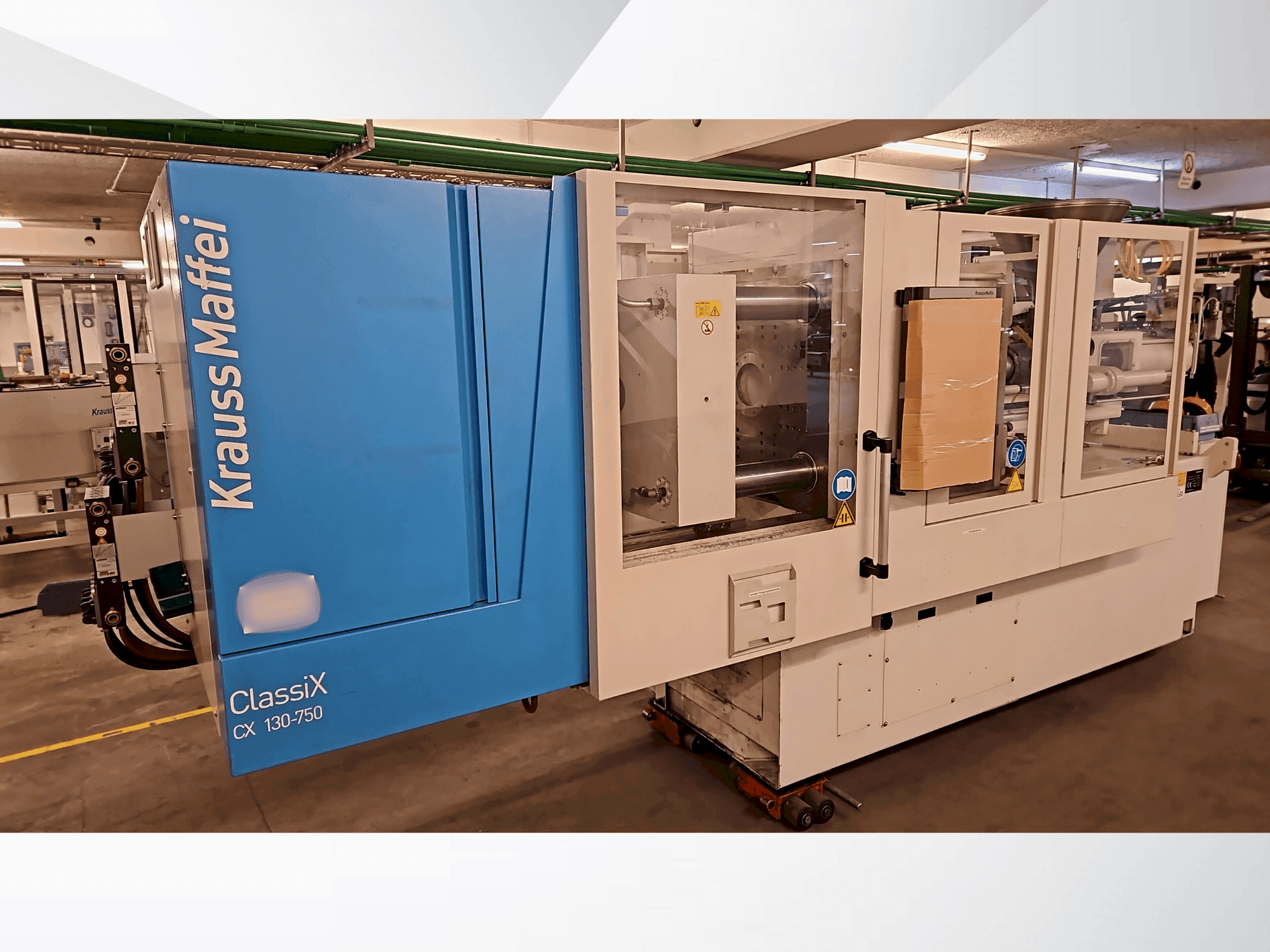 Masina Krauss Maffei 130-750 CX eestvaade