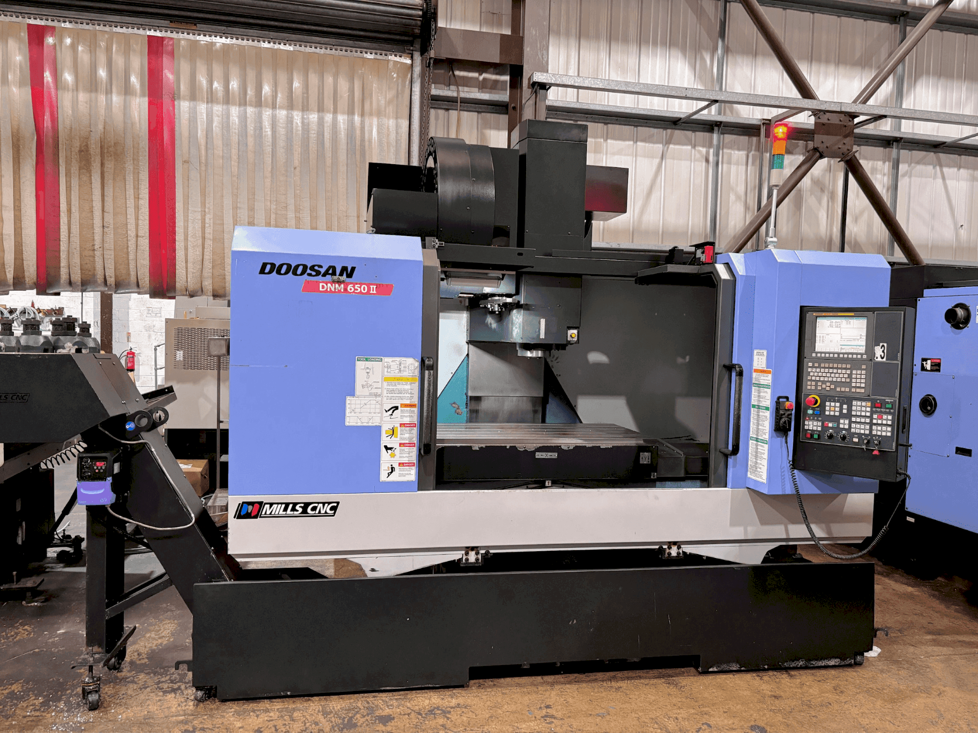Masina DOOSAN DNM 650 II eestvaade