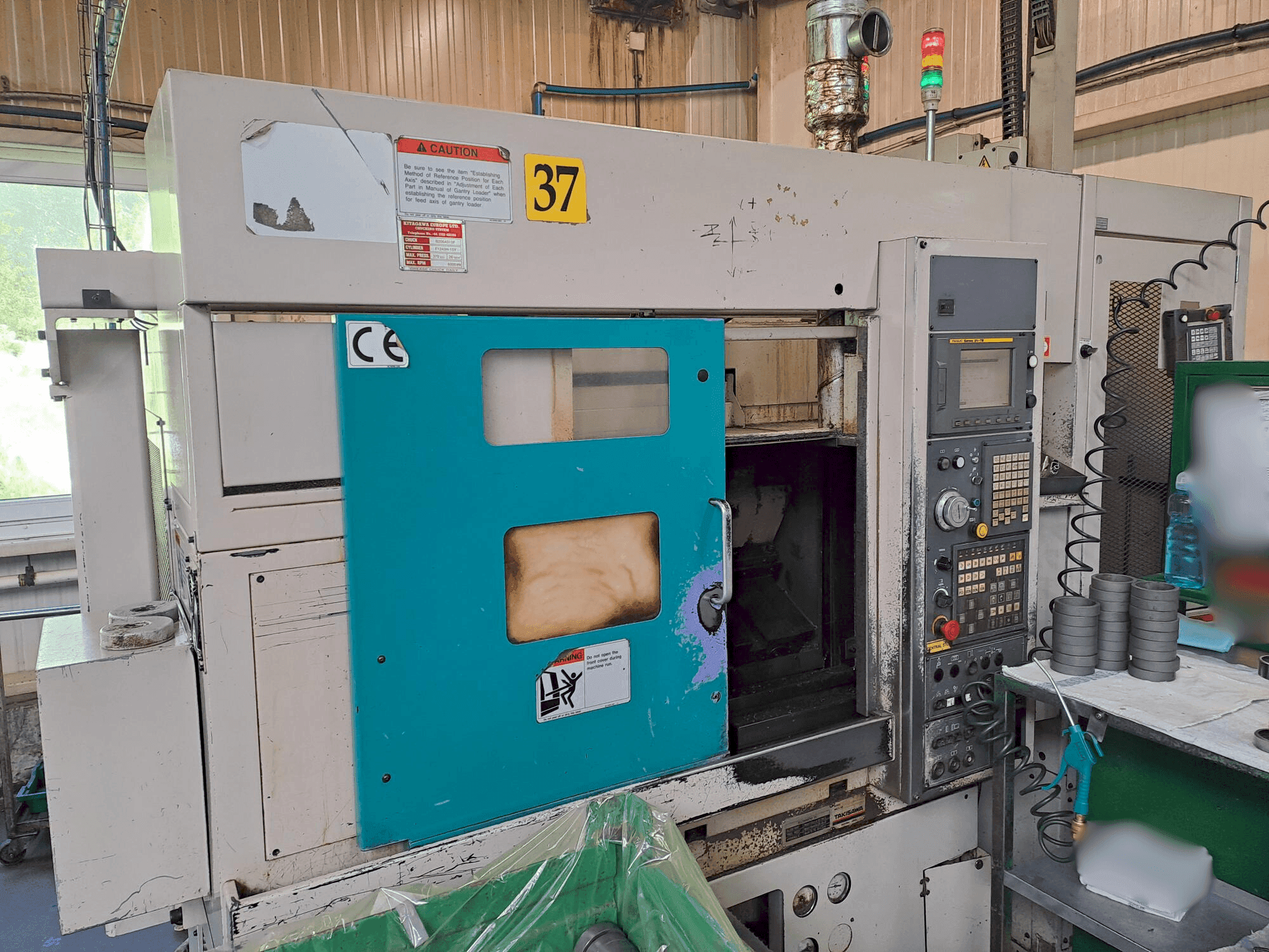 Masina Takisawa TC 200 eestvaade