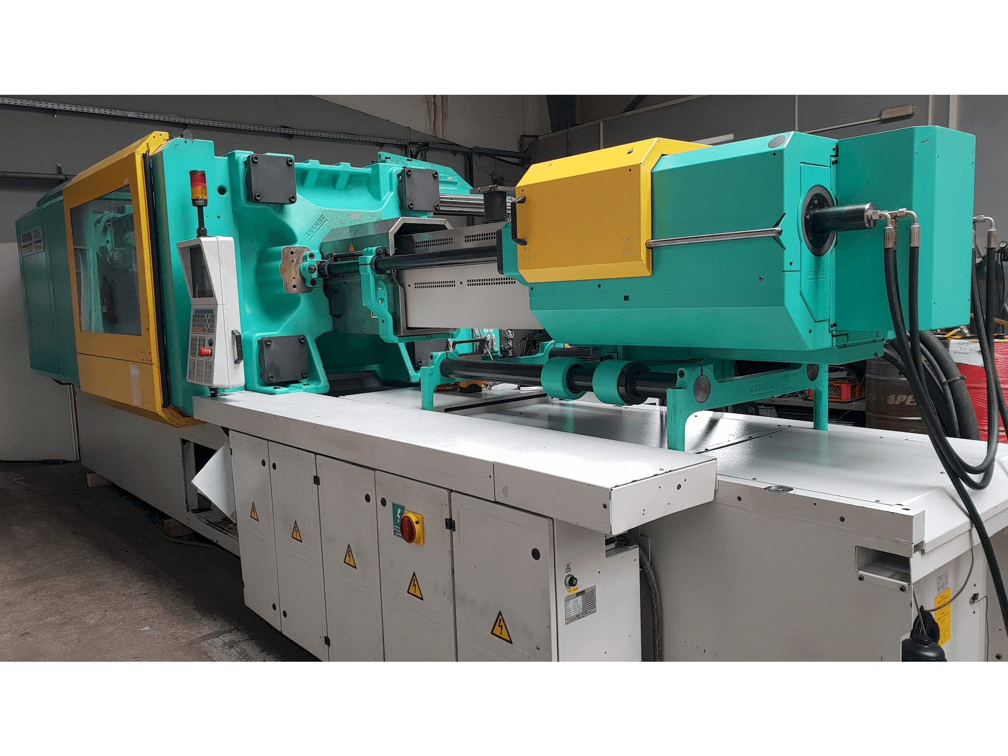 Masina Arburg Multilift H 720 - 3200 - 1300 eestvaade