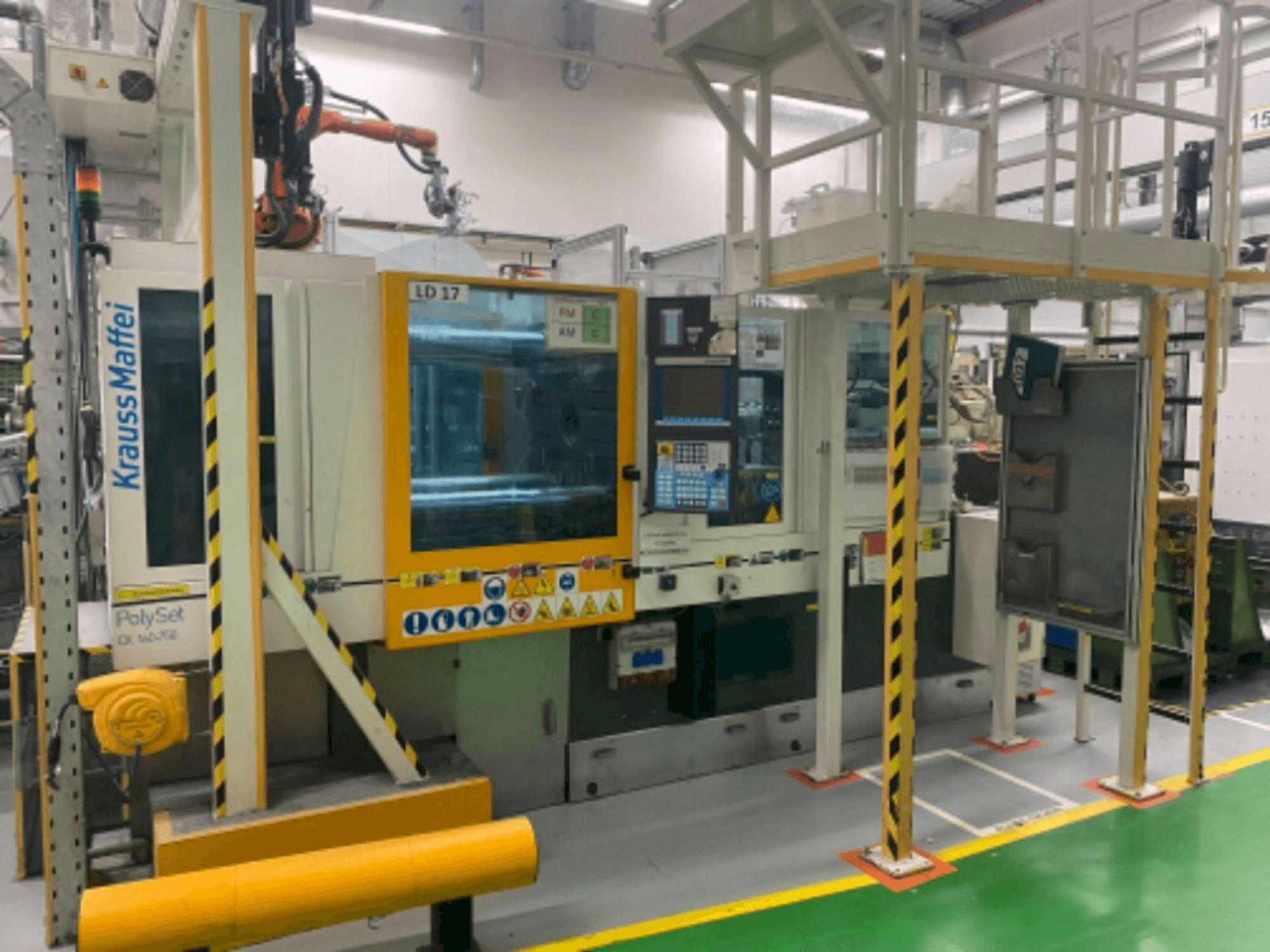 Masina Krauss Maffei 160/750 CX POL eestvaade