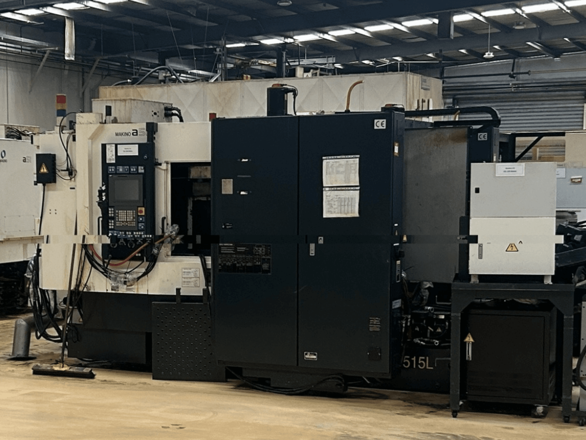 Makino A51-5XR horisontaalne töötlemiskeskus, esivaade, millel on näha juhtpaneel, toiteallikas ja masina osad.