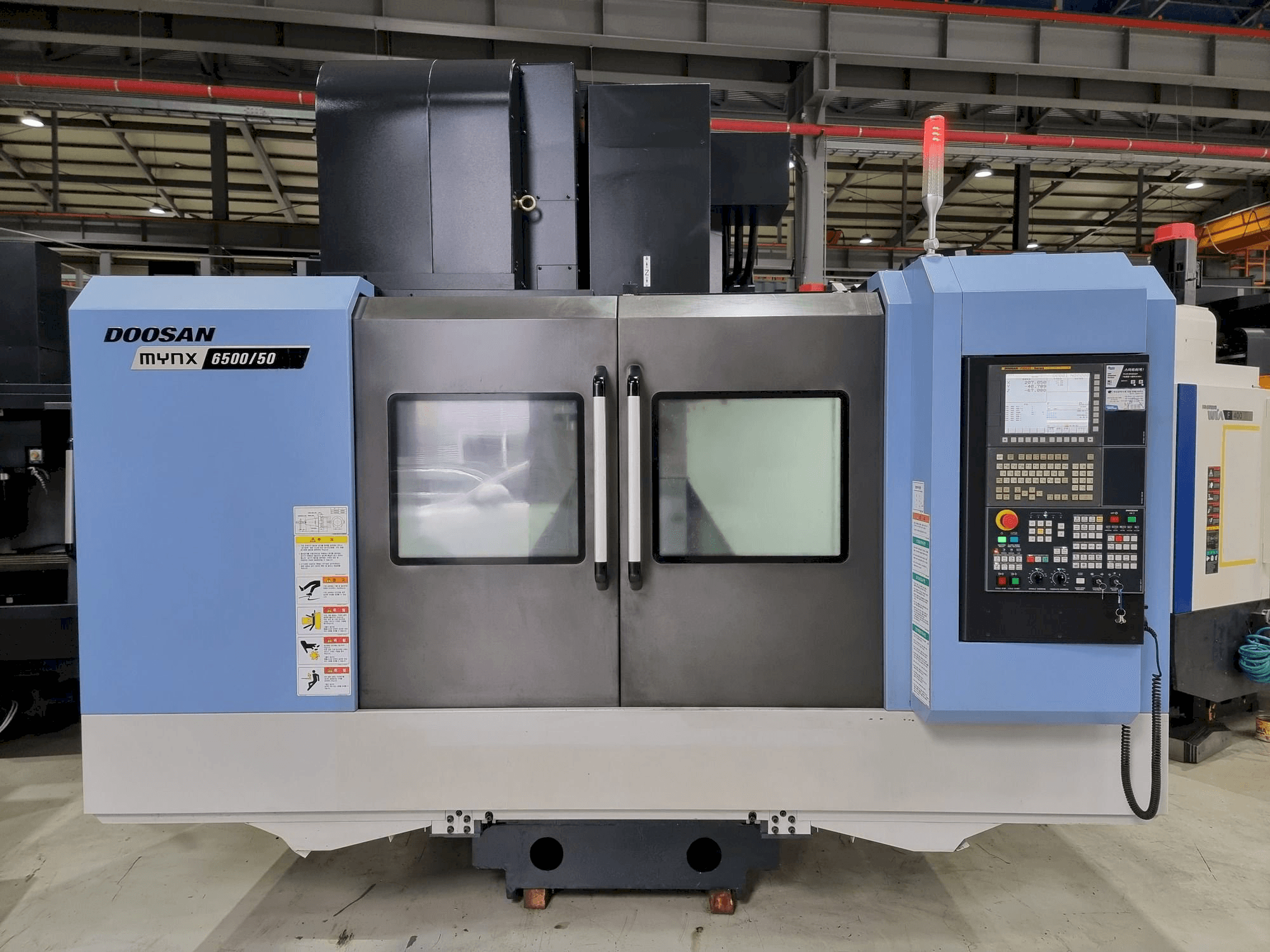 Masina Doosan MYNX 6500/50 eestvaade