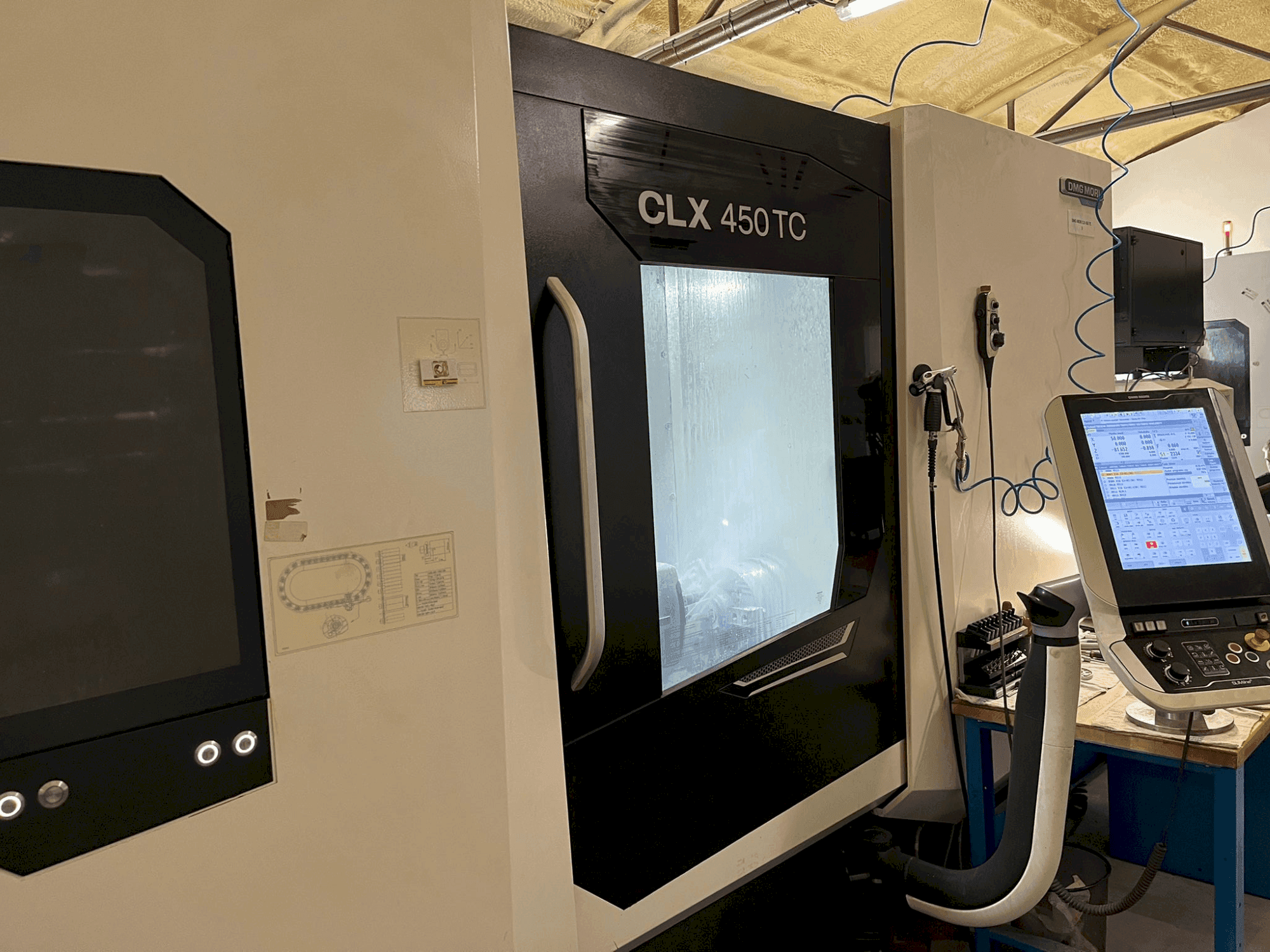 Masina DMG MORI CLX 450 TC eestvaade