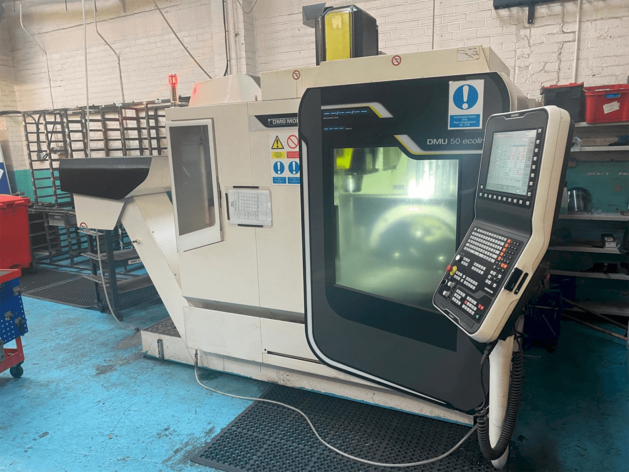Masina DMG DMU Ecoline 50 5 Axis VMC eestvaade
