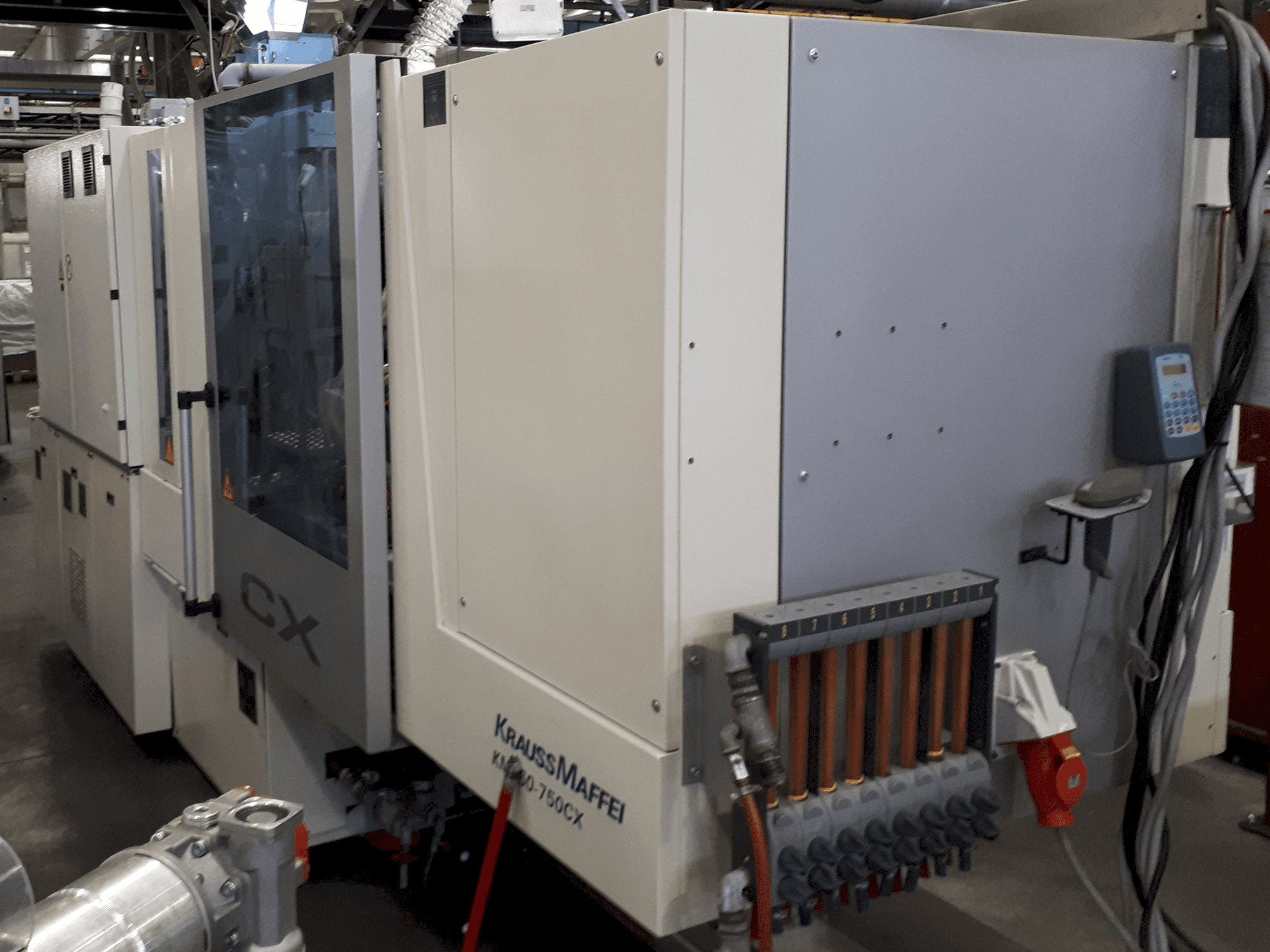 Masina Krauss Maffei 160-750 CX eestvaade