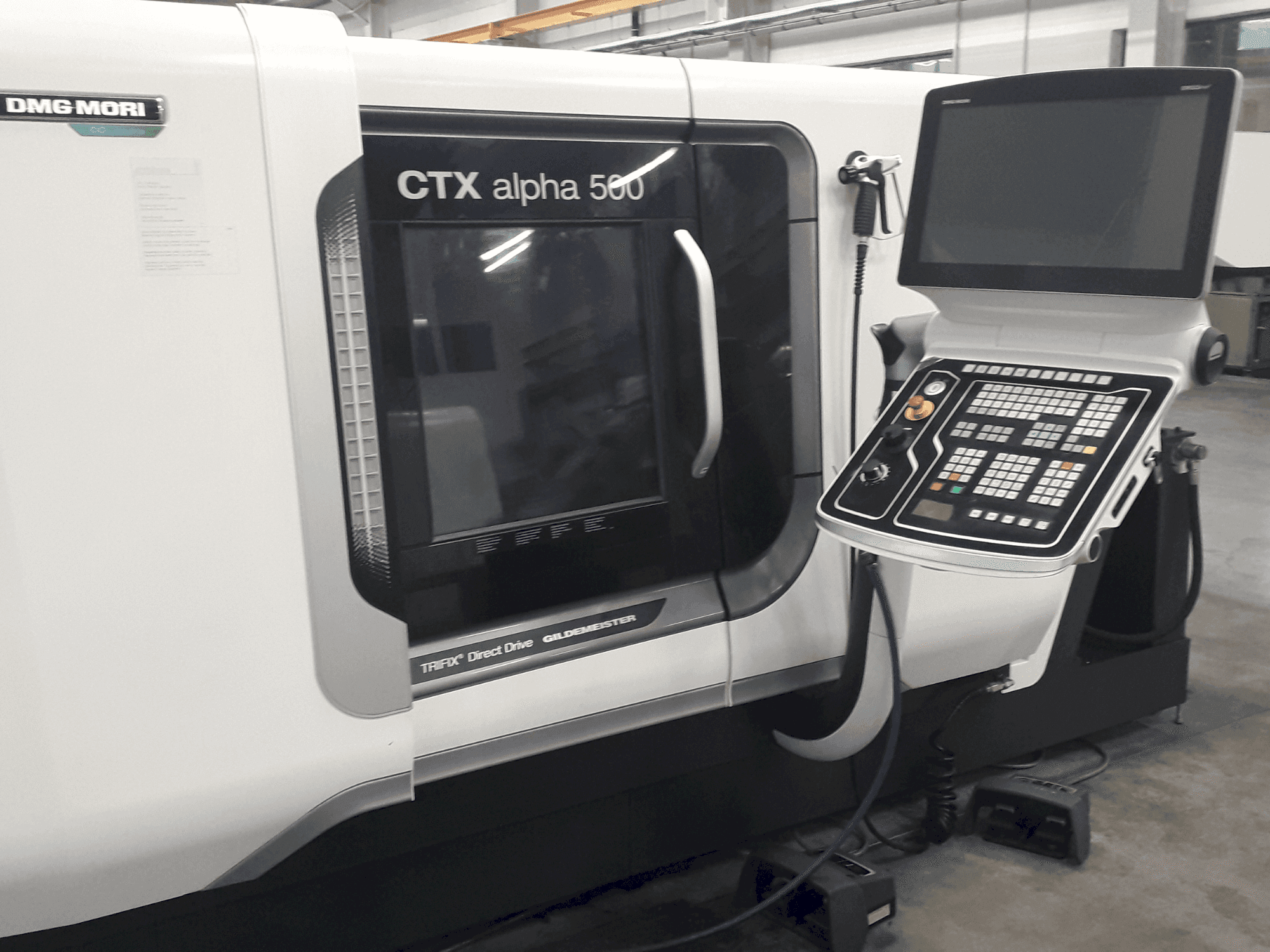 Masina DMG MORI CTX Alpha 500 V6 eestvaade