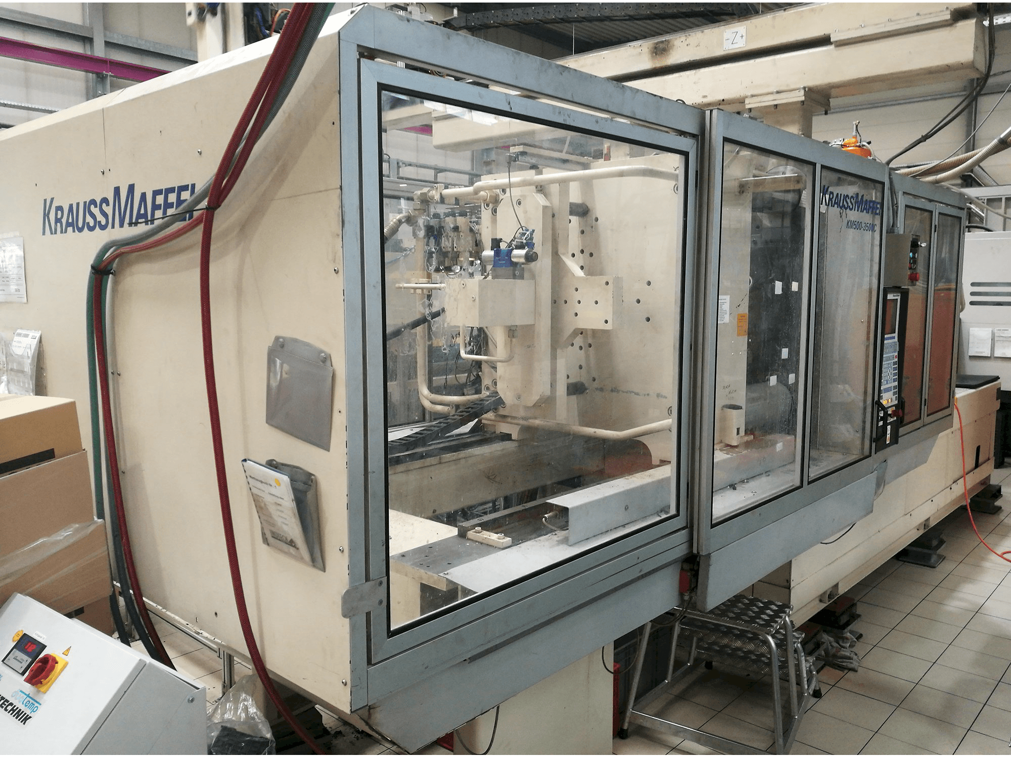Masinavaade Krauss Maffei KM 500-3500 C1 vasakult