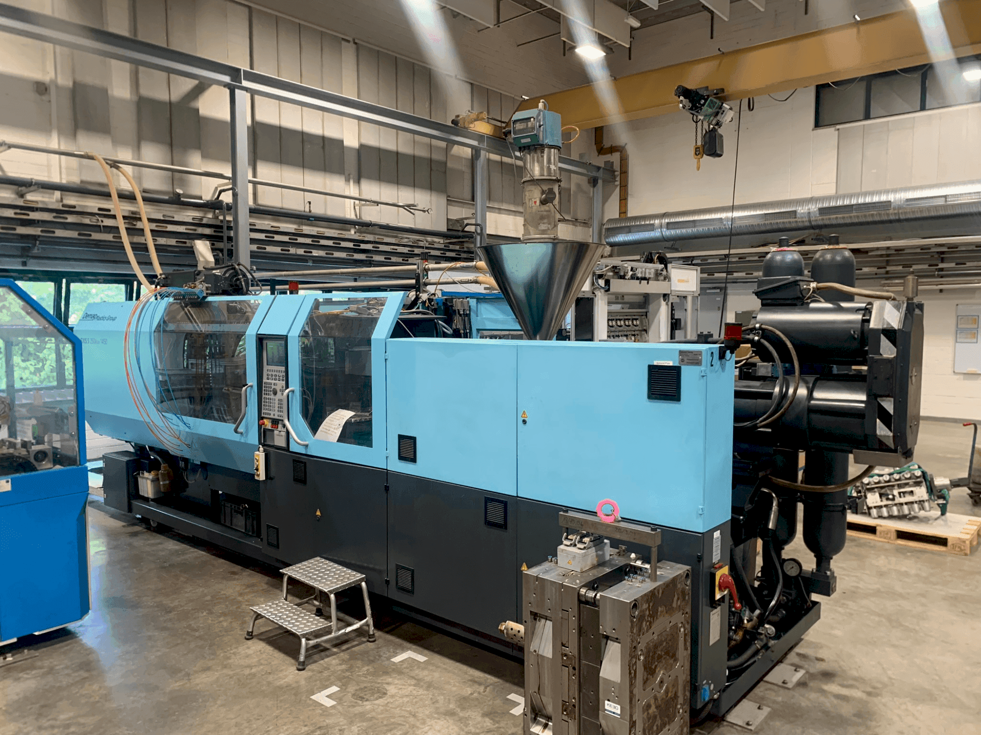 Masina DEMAG EL-Exis S 250/630-1450 eestvaade