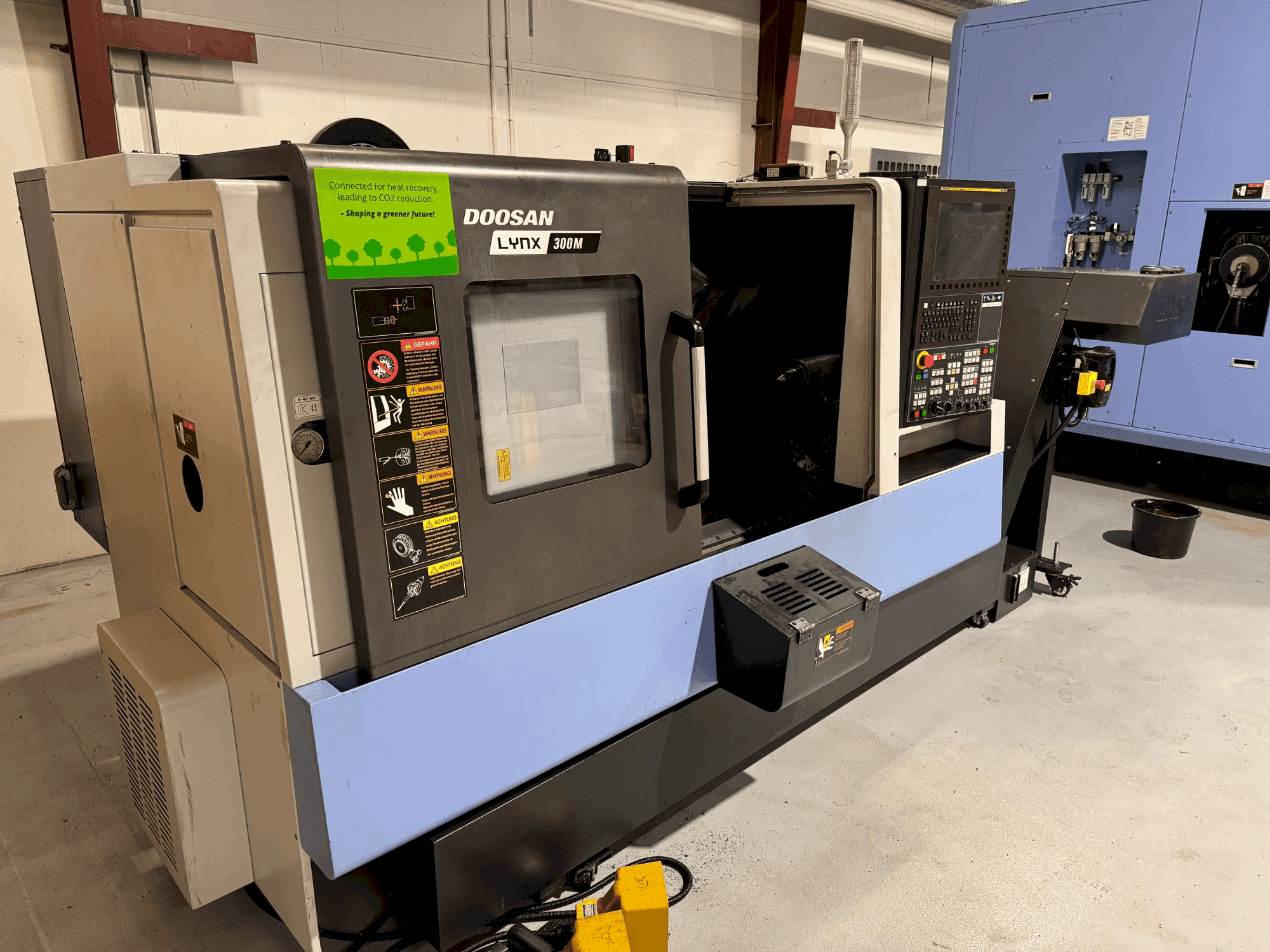 Masina DOOSAN LYNX 300M eestvaade