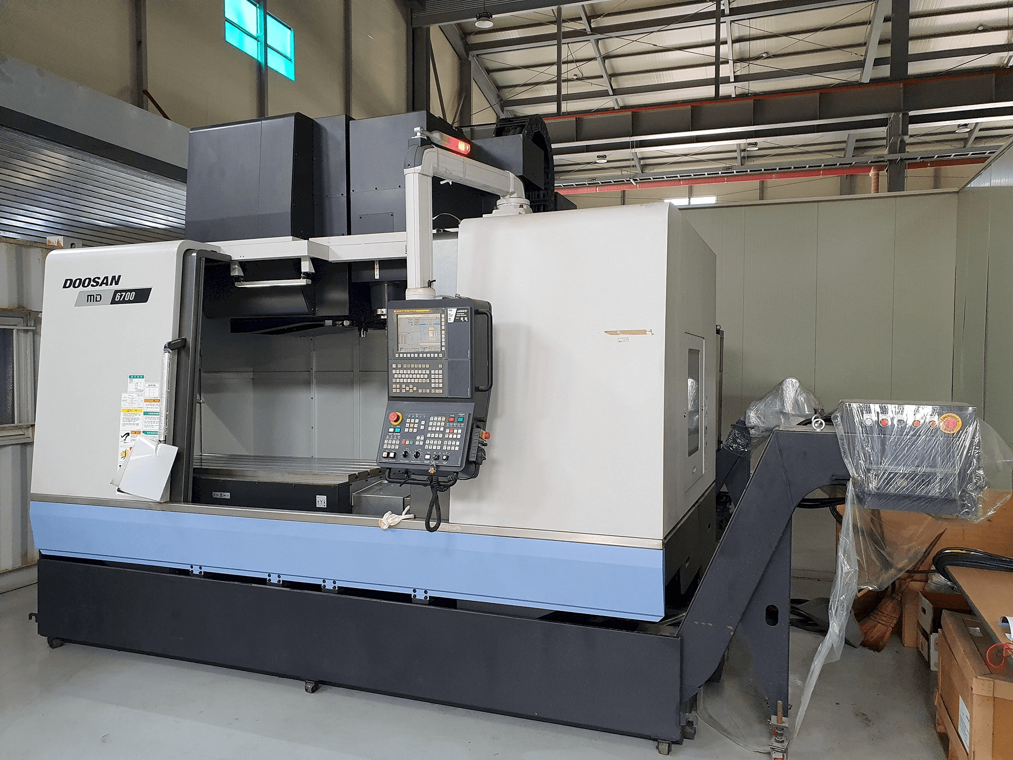 Masina Doosan MD6700 eestvaade