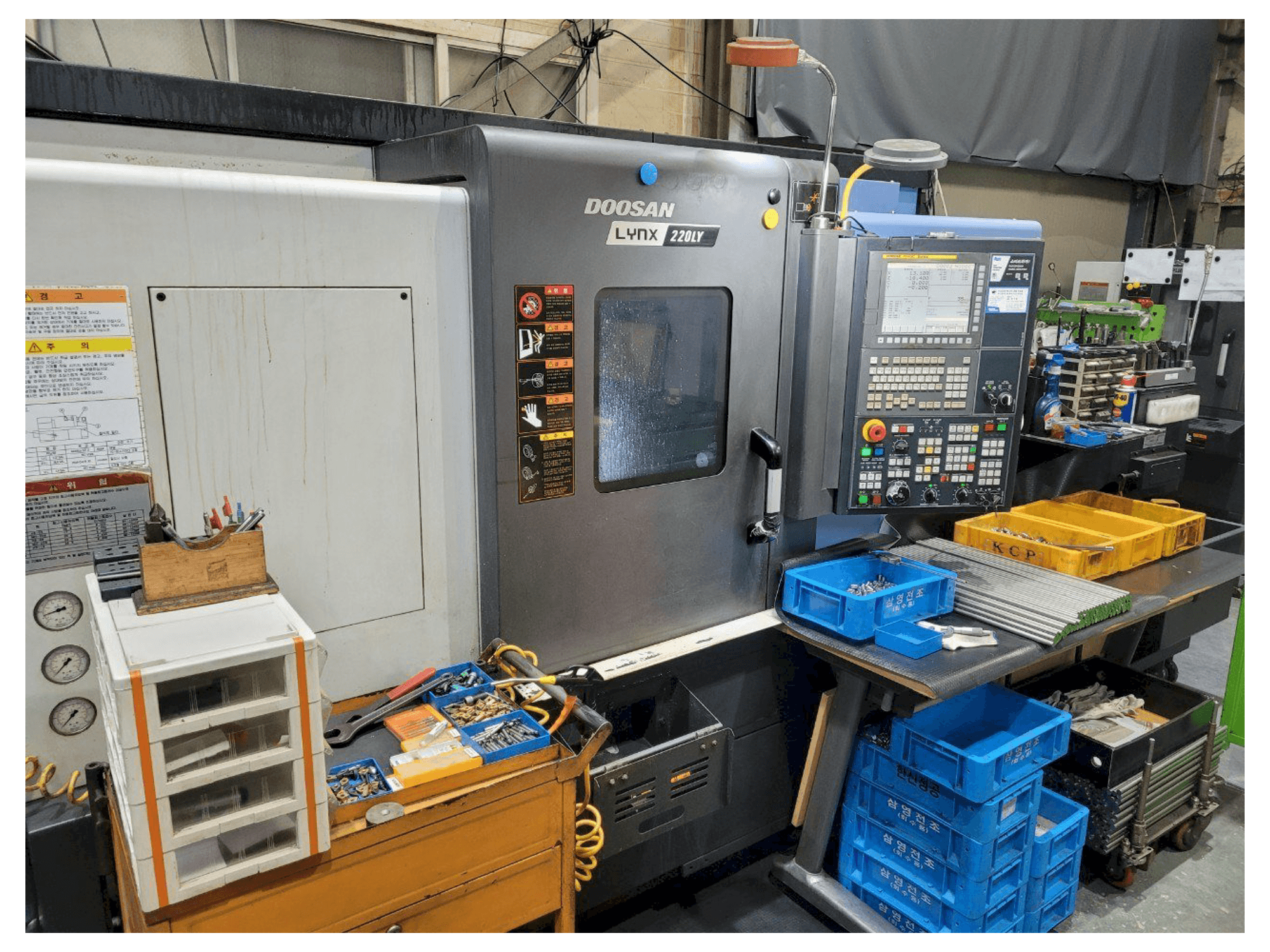 Masina Doosan LYNX220LYA eestvaade