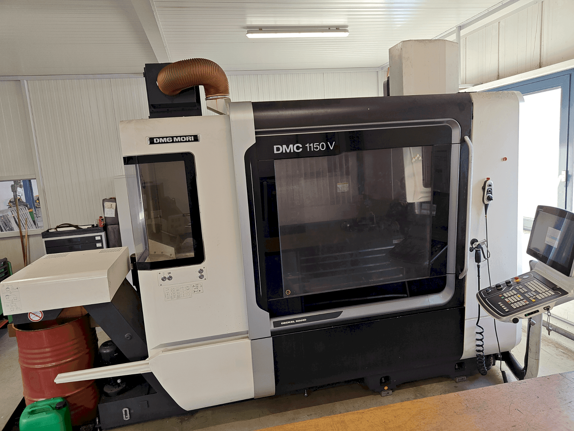 Masina DMG MORI DMC 1150 V eestvaade