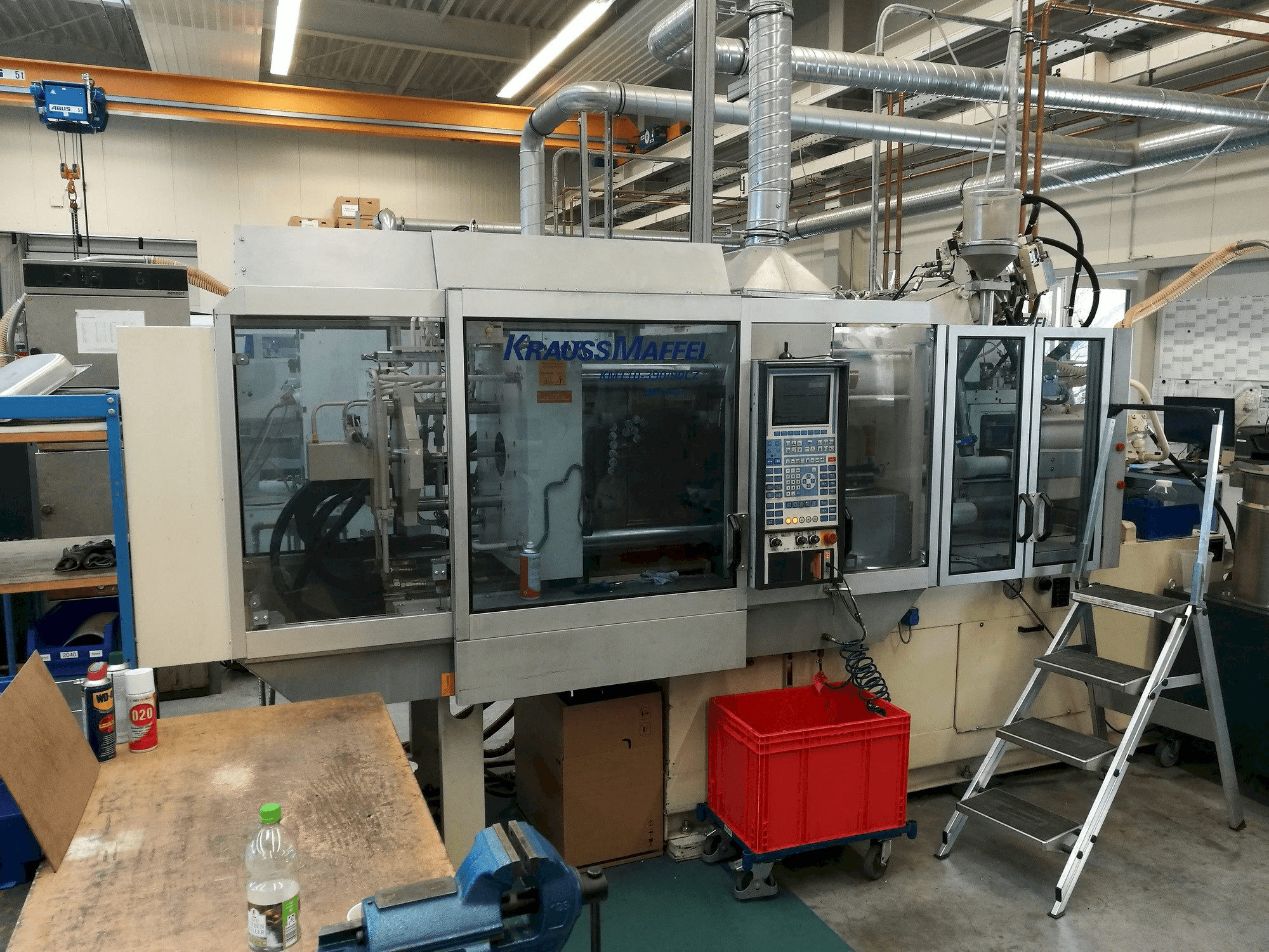 Masina Krauss Maffei 110-390/90 CZ eestvaade