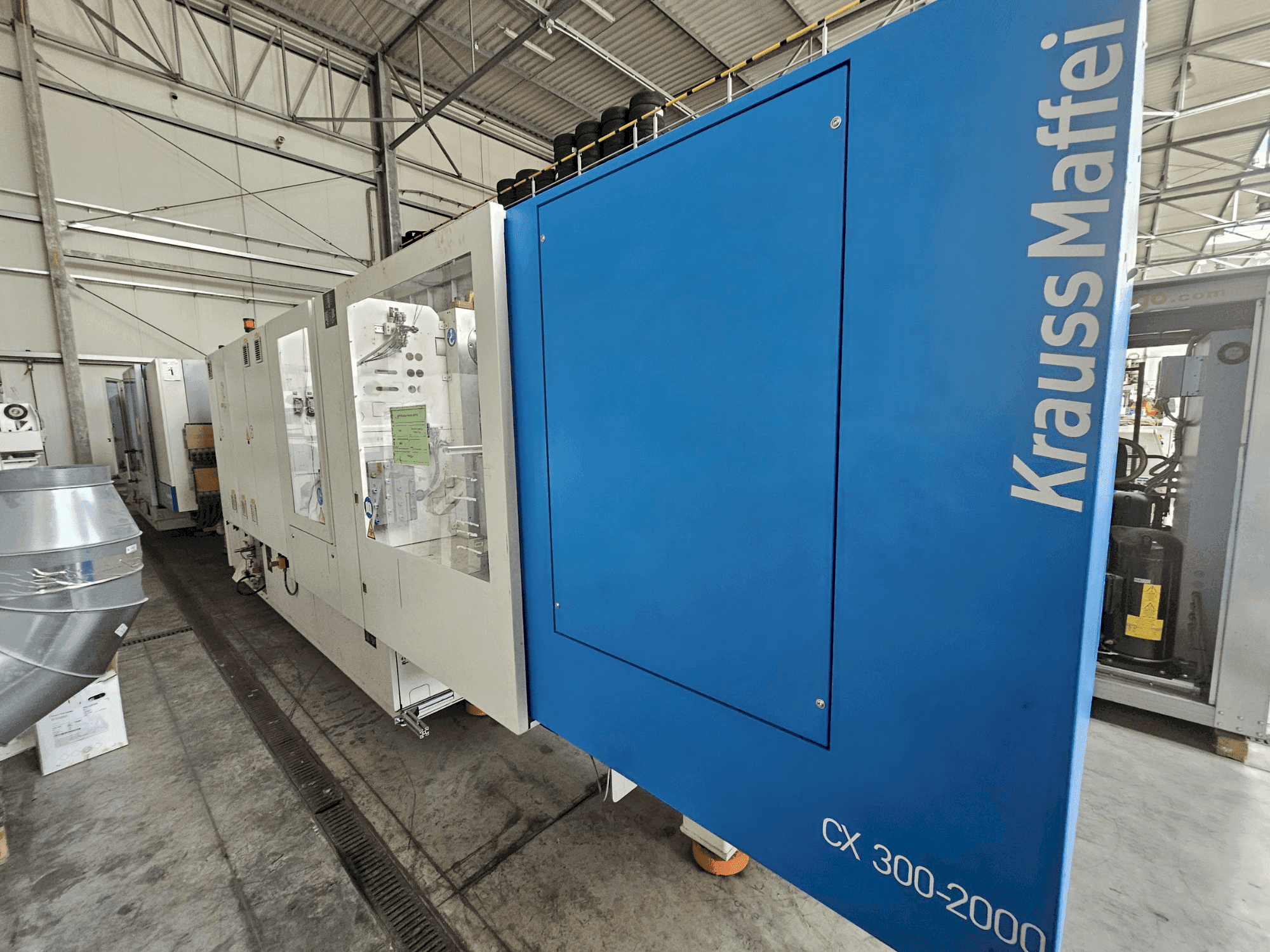Masina Krauss Maffei 300-2000 CX eestvaade