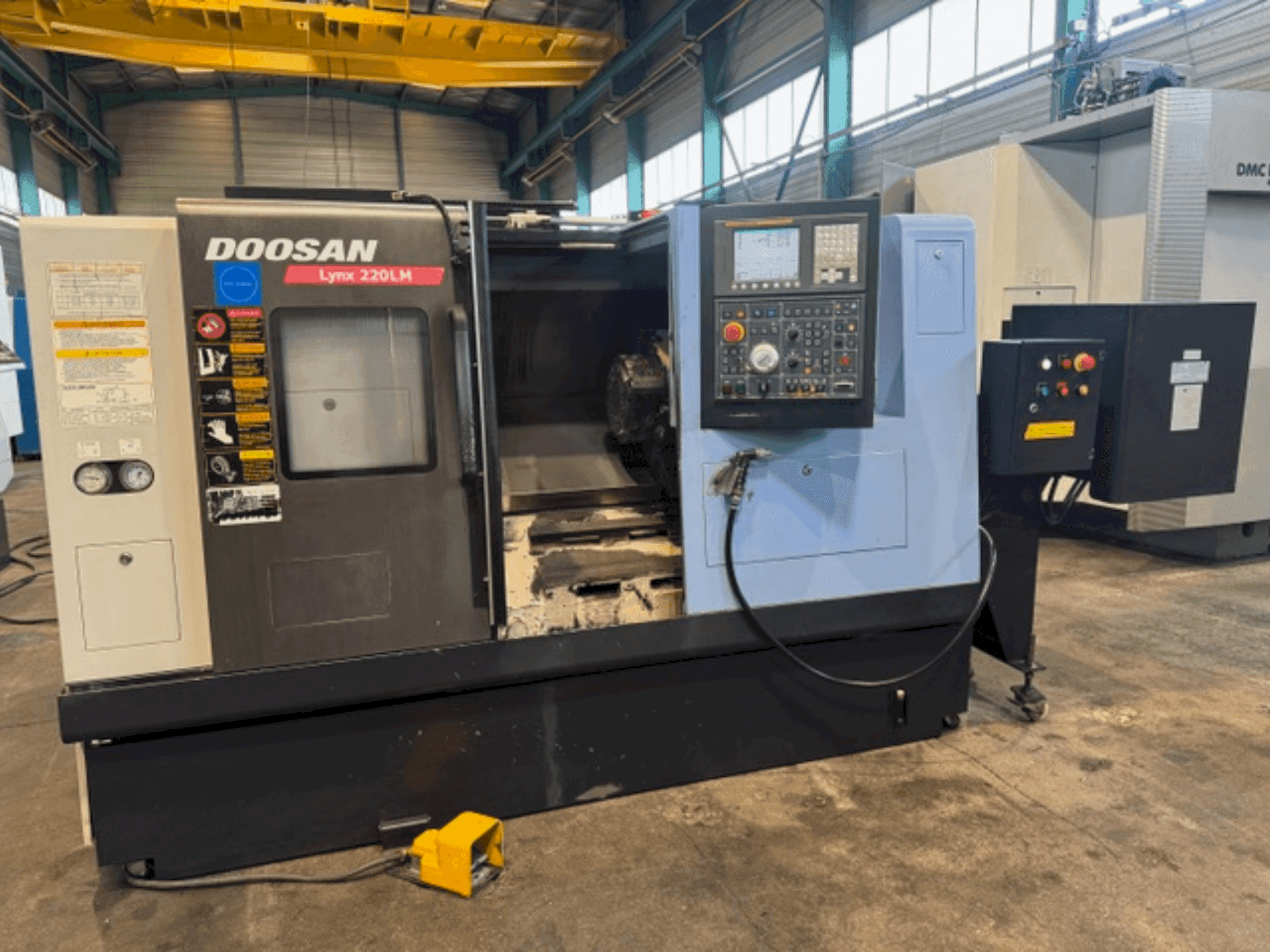 Masina DOOSAN LYNX 220 LMA eestvaade