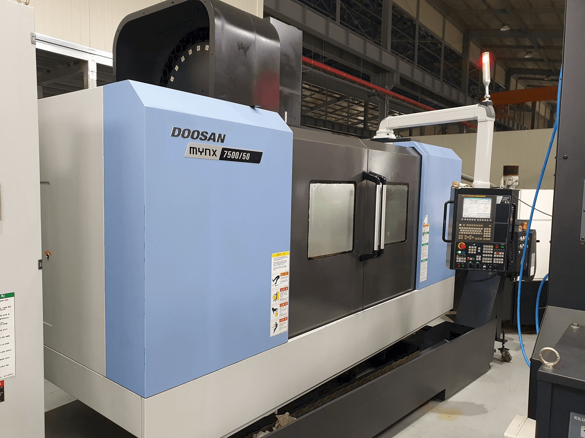 Masina Doosan MYNX 7500/50 eestvaade
