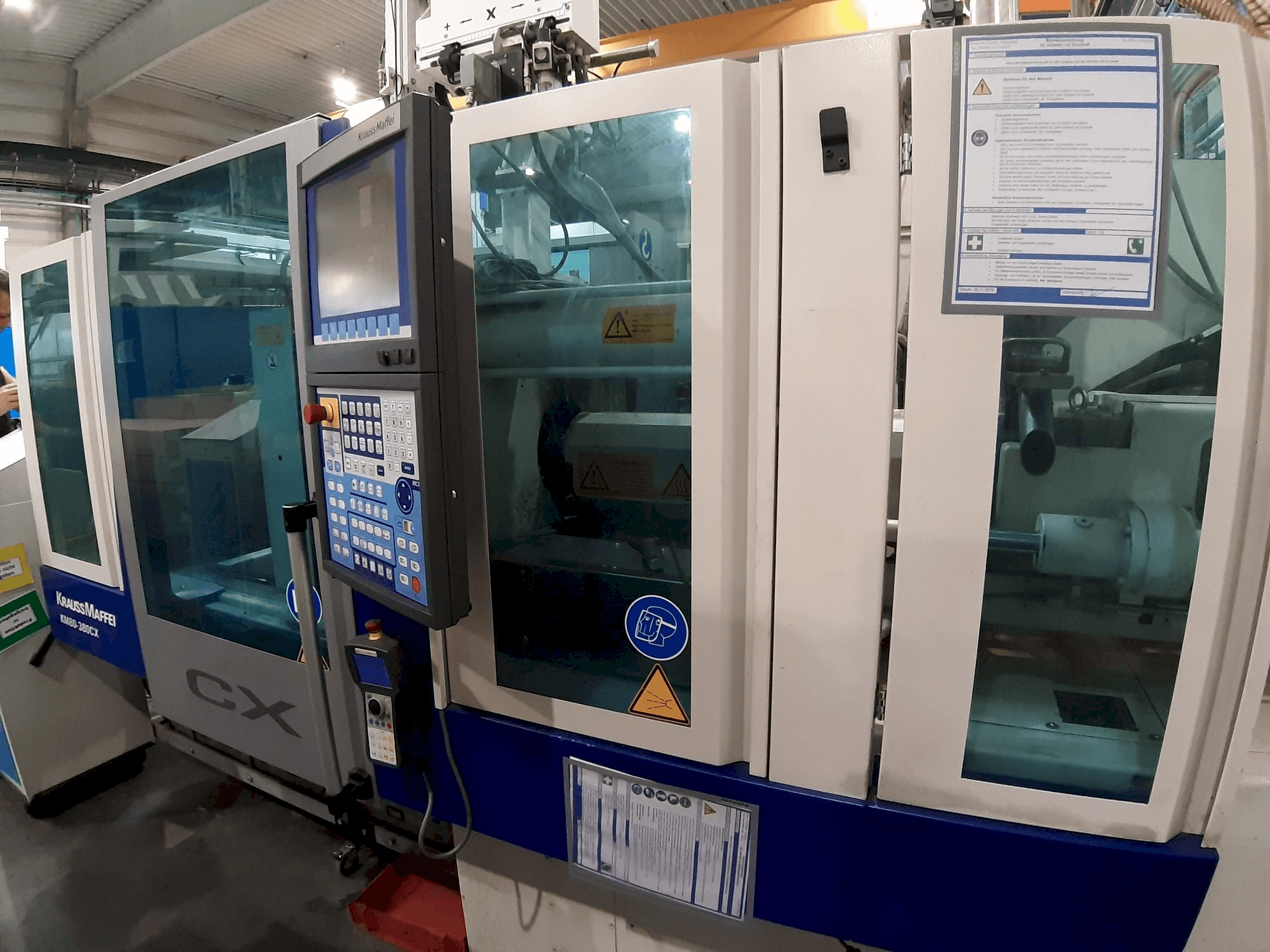 Masina Krauss Maffei 80 - 380 CX eestvaade