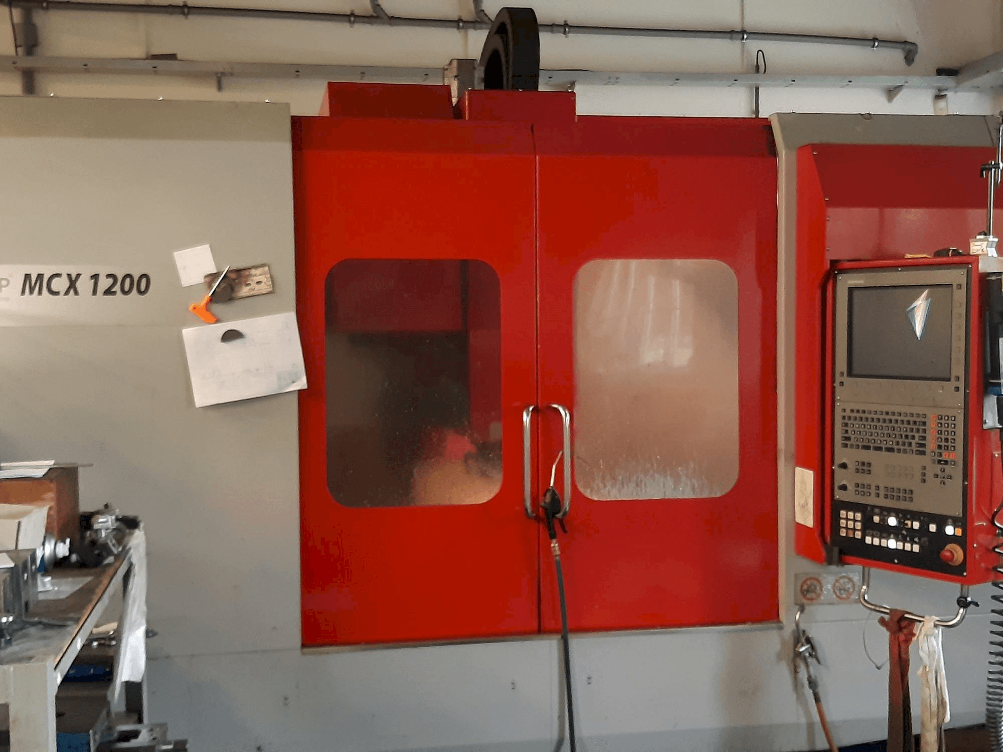 Masina EMCO MCX 1200 eestvaade