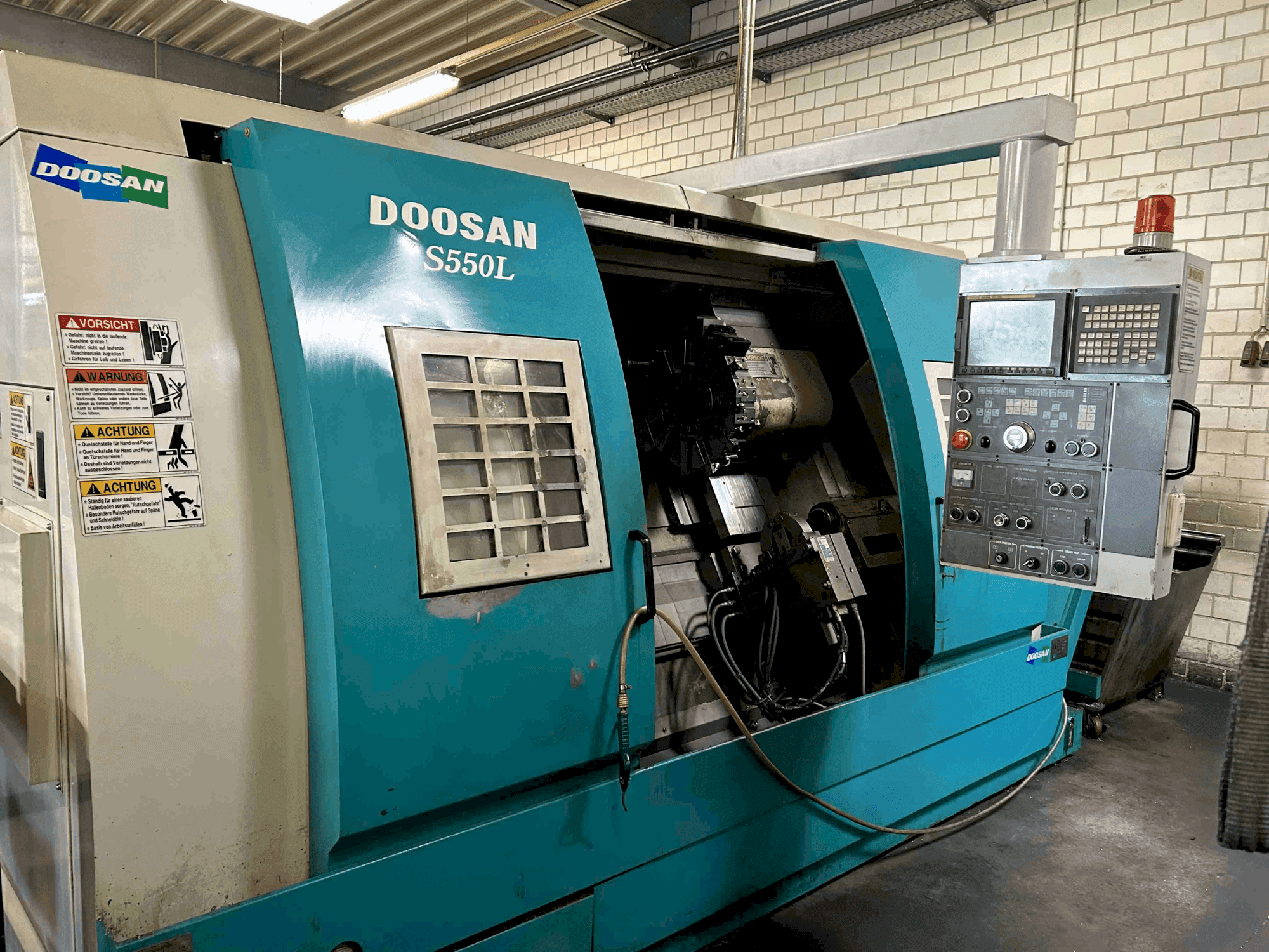 Masina DOOSAN S550L eestvaade