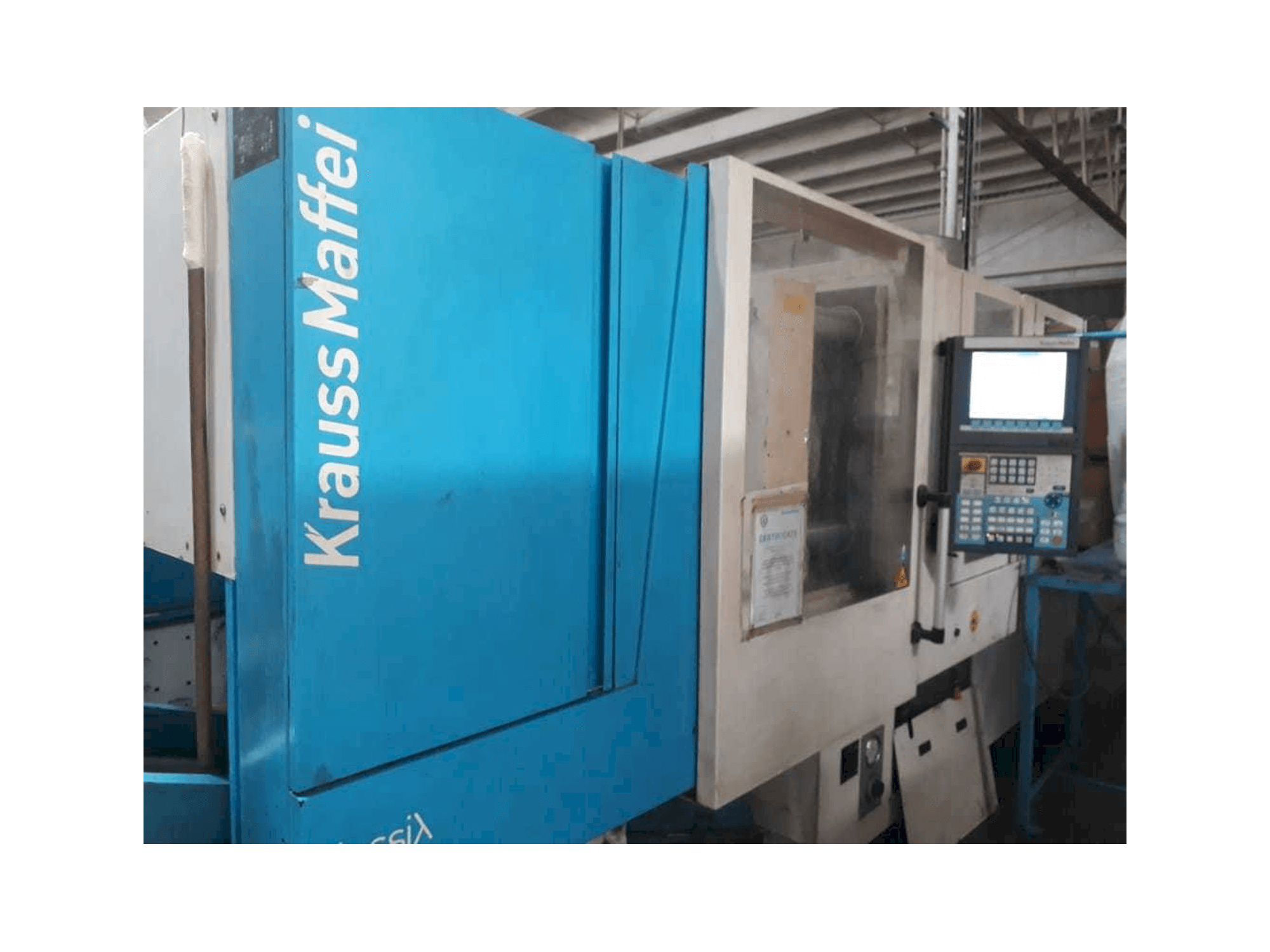 Masina Krauss Maffei 160/750 CX eestvaade