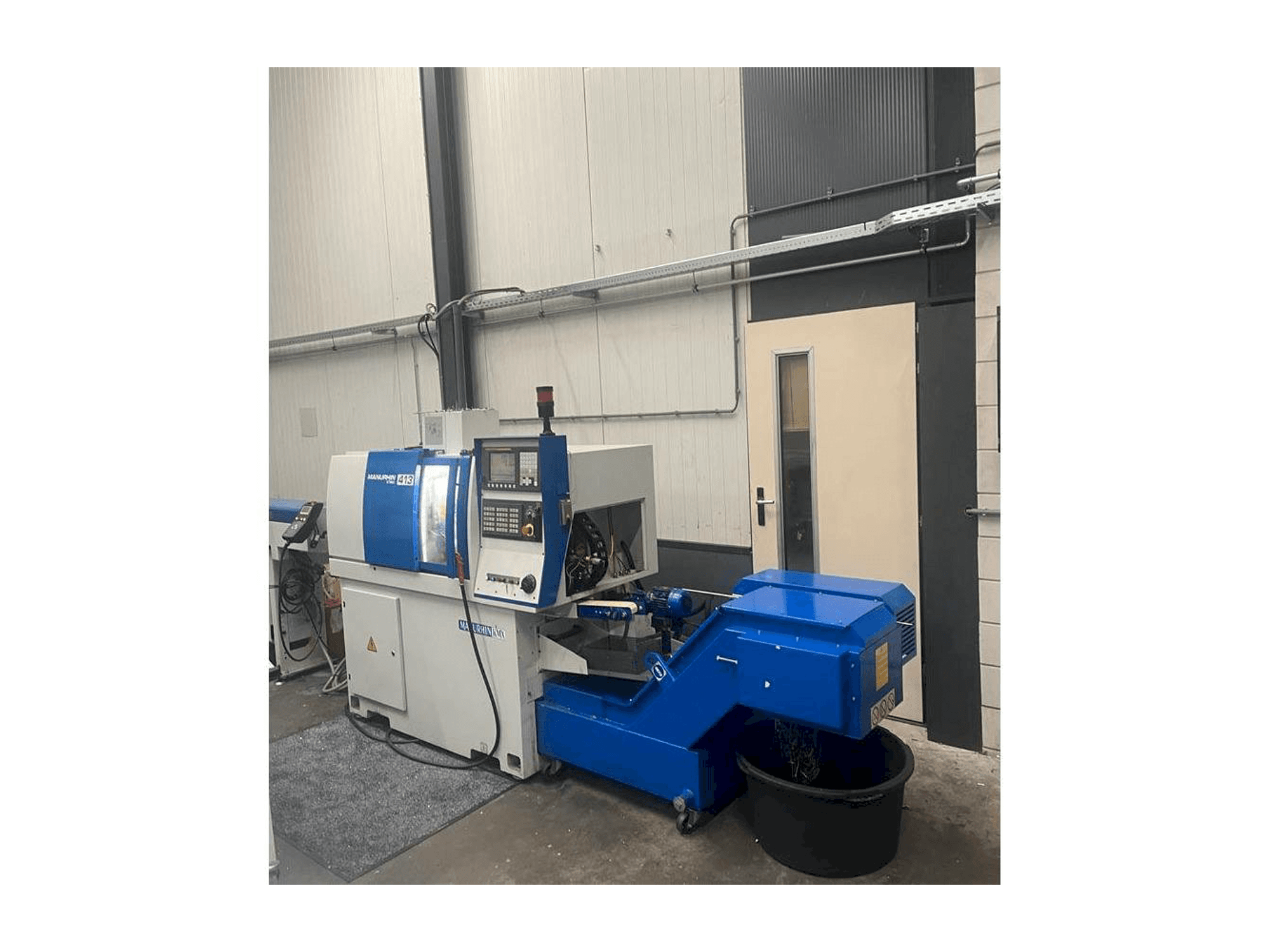 Masina Manurhin K'MX 413 eestvaade