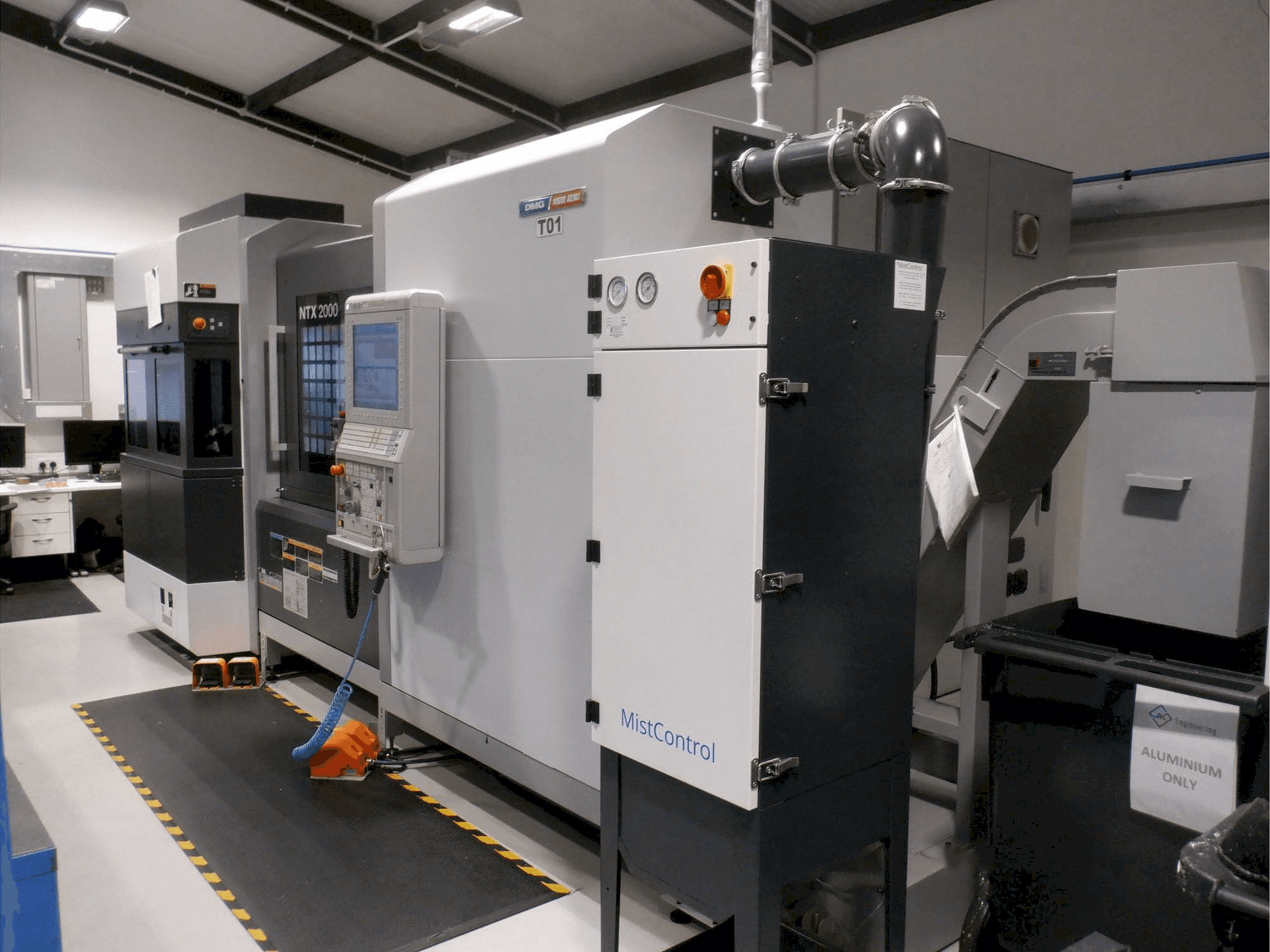 Masina DMG MORI NTX 2000 eestvaade