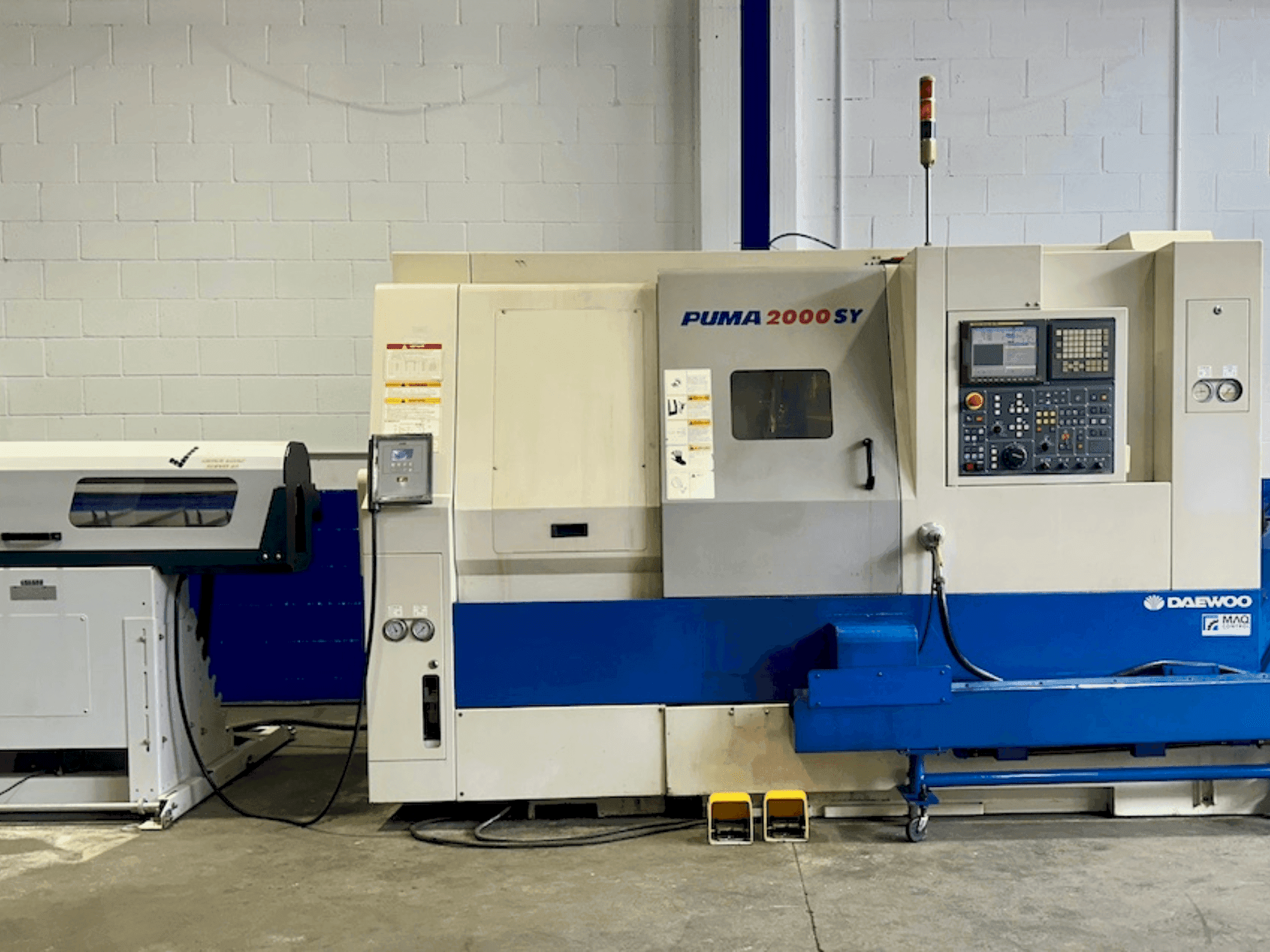Masina DOOSAN PUMA 2000SY eestvaade