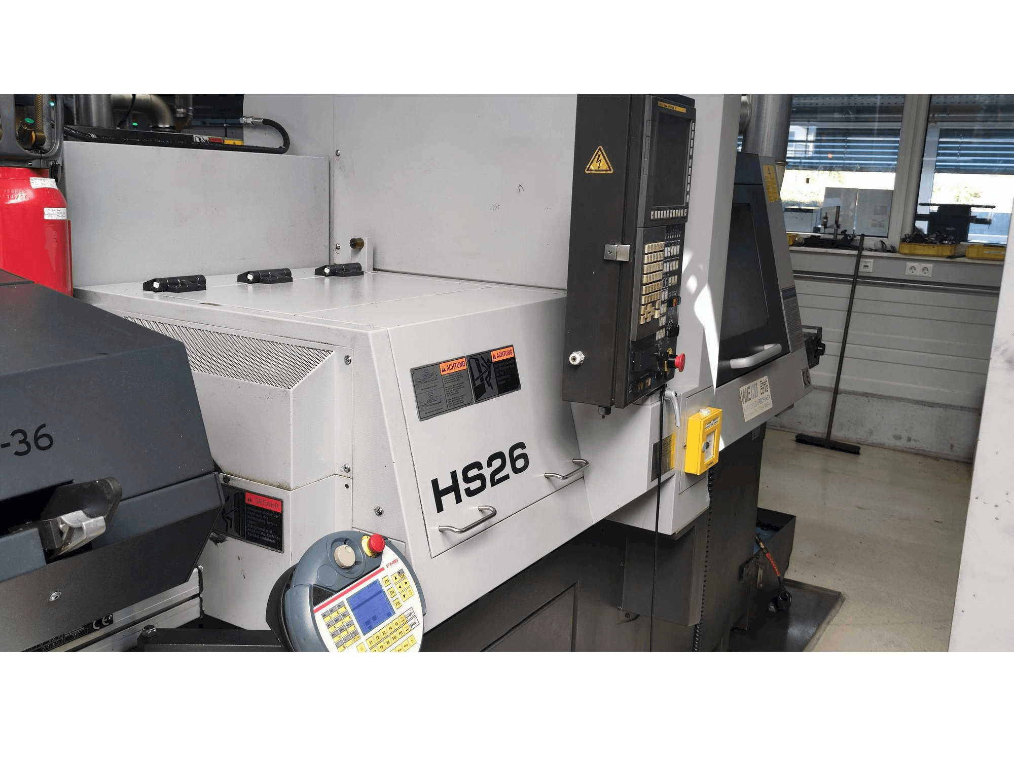 Masina TSUGAMI HS26 vasaku külje vaade