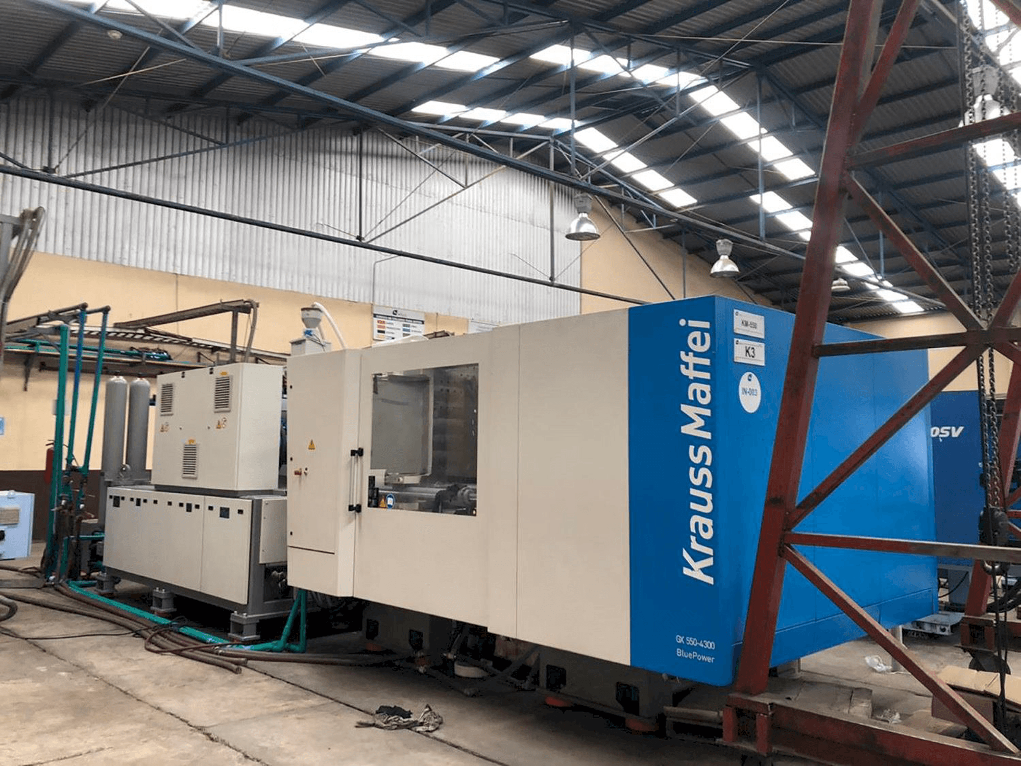 Masina Krauss Maffei 550-4300 GX eestvaade