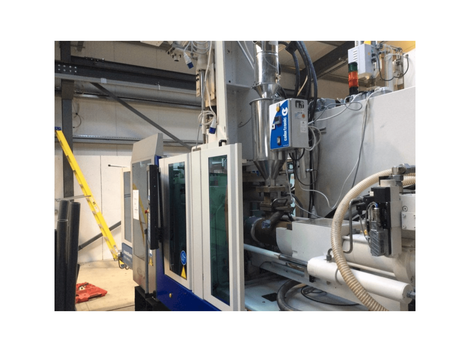 Masina Krauss Maffei 80-180-55 CX V eestvaade